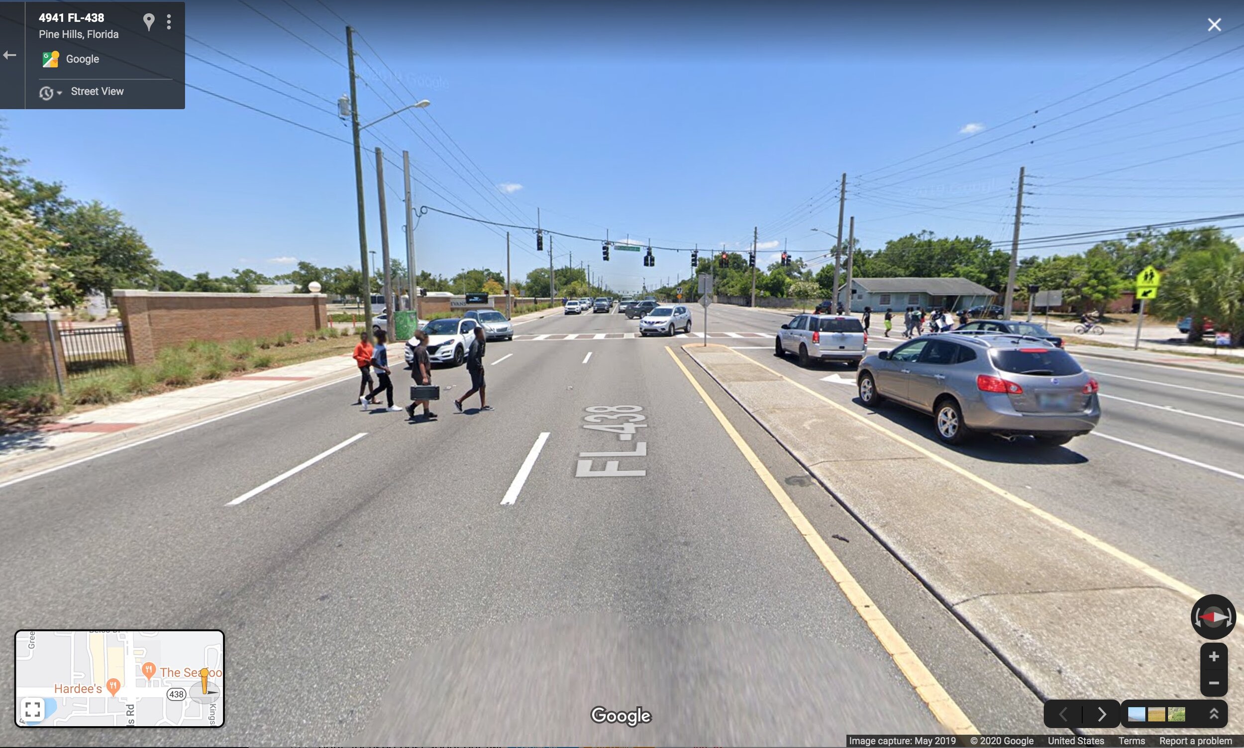  Given the risk of not being seen by the drivers of turning cars, the crosswalk at the school entrance is not clearly any safer than where these students have chosen to cross. 