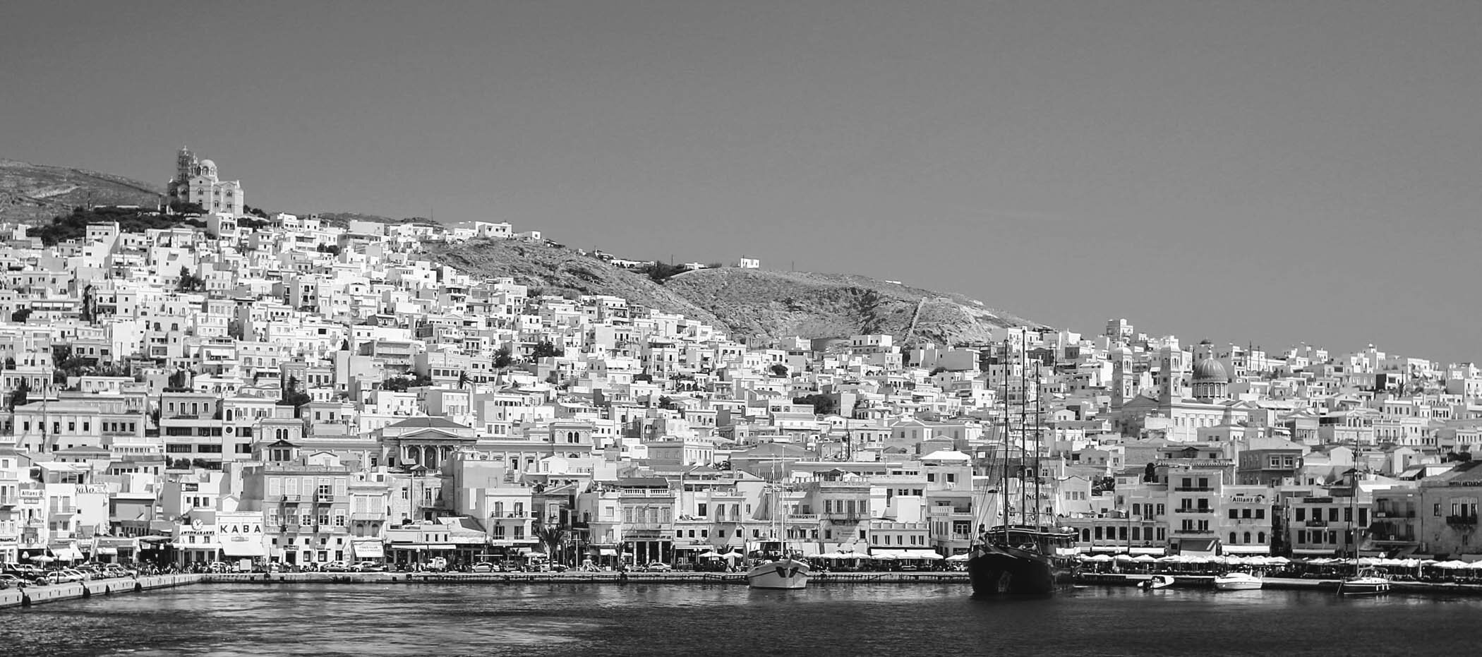 “Hiving” and “barnacling” are two strategies for modifying existing buildings that have been instrumental in shaping traditional cities, such as this one in Hermoupolis, Greece. (Image courtesy of Island Press.)