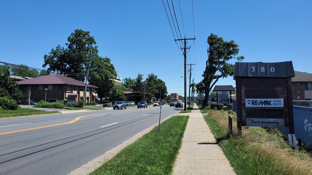 View along commercial stretch of Maple Avenue right outside the town center.
