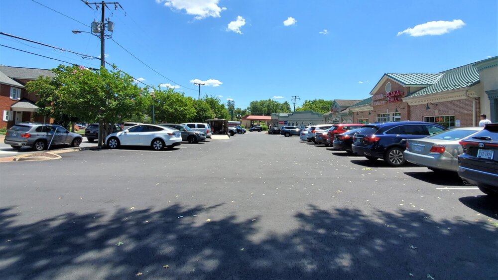 With only a single storefront facing Maple Avenue, this strip mall and its parking lot sit at 90 degrees to the main thoroughfare, minimizing the sense of gaps in the street.