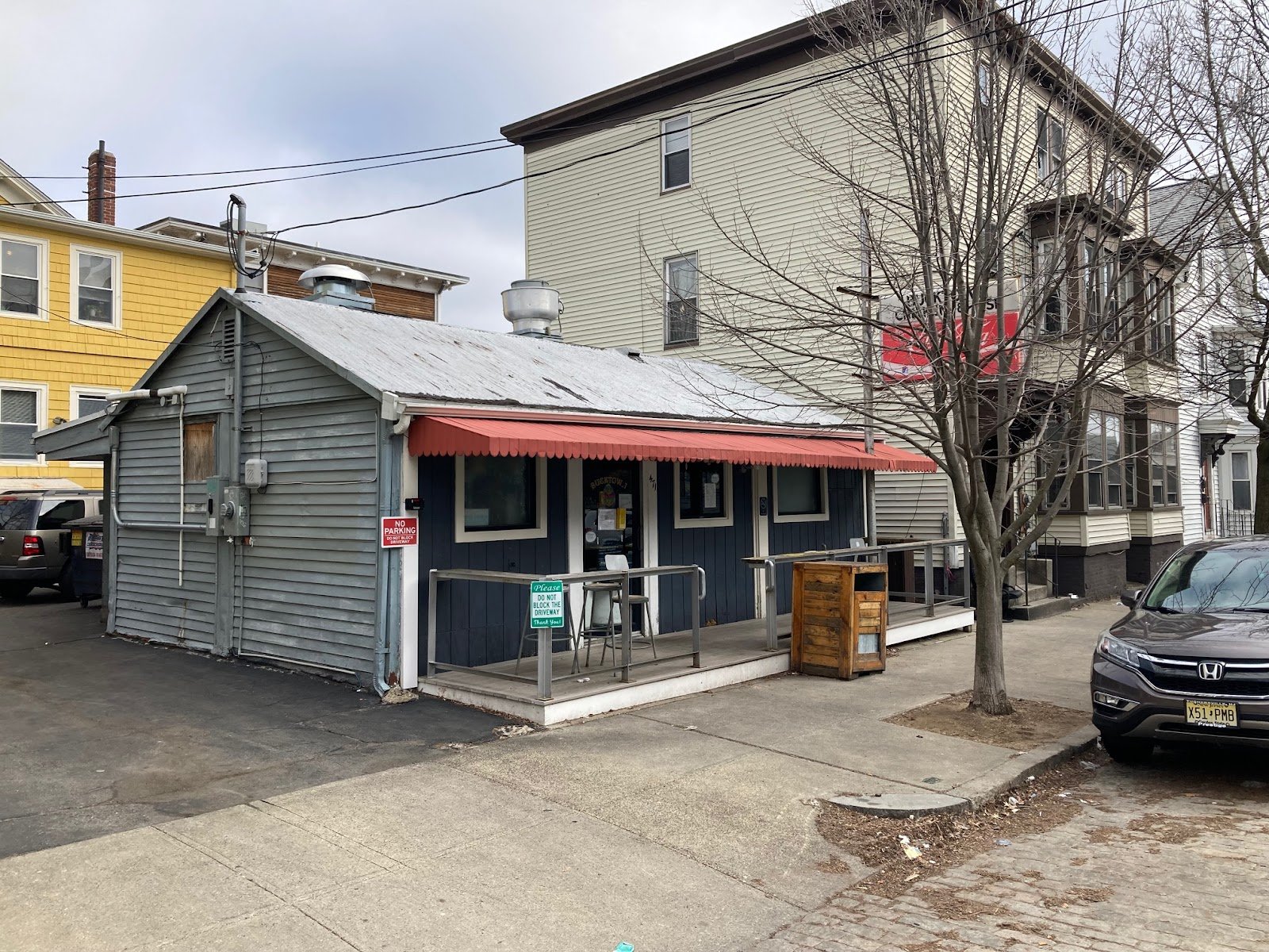  A little single-story fish- and chicken-fry place sandwiched between triple-deckers makes for a great place to get lunch or dinner. 