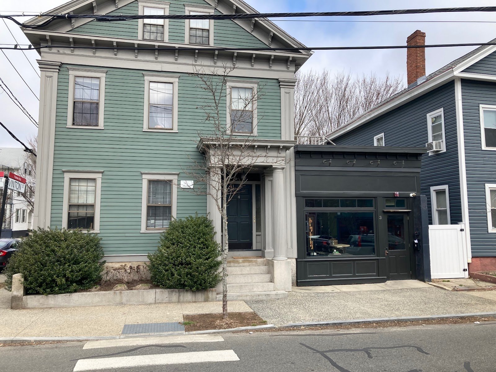  Here’s one built to the side of the main house. How much nicer is it to have a cute little restaurant instead of a driveway? 