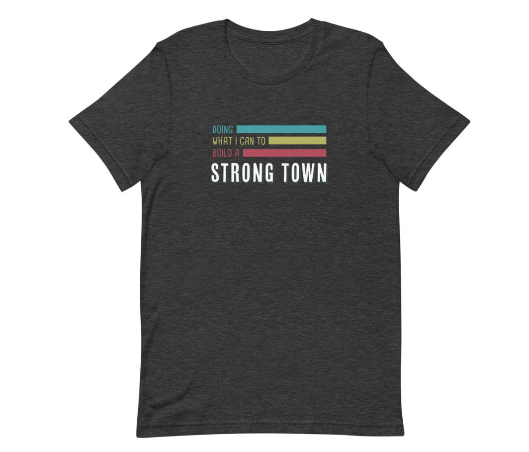 Image of Strong Towns t-shirt with the phrase "Doing what I can to build a Strong Town" emblazoned on the front