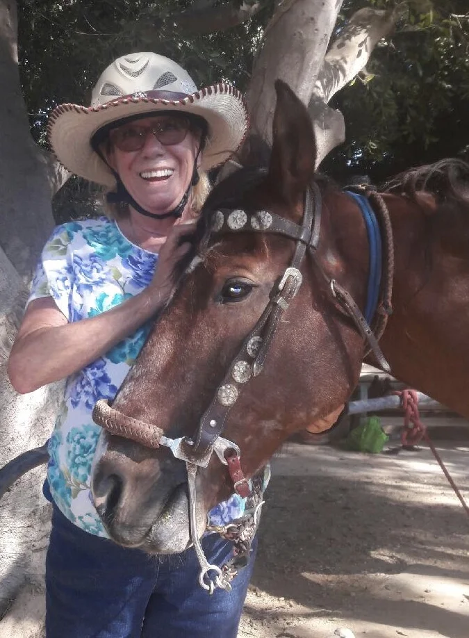  Happy Jenny and her trusty steed.&nbsp; Her helmet hat looks great! 