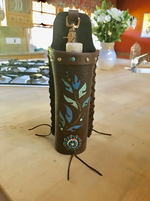  Tina's water bottle holder, made to match her awesome helmet hat! 
