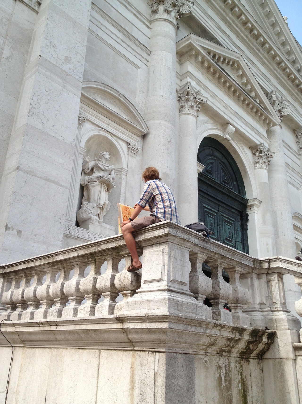 Student Luke Watson (PiV '13) painting at the Redentore (photo: Chris Wright).
