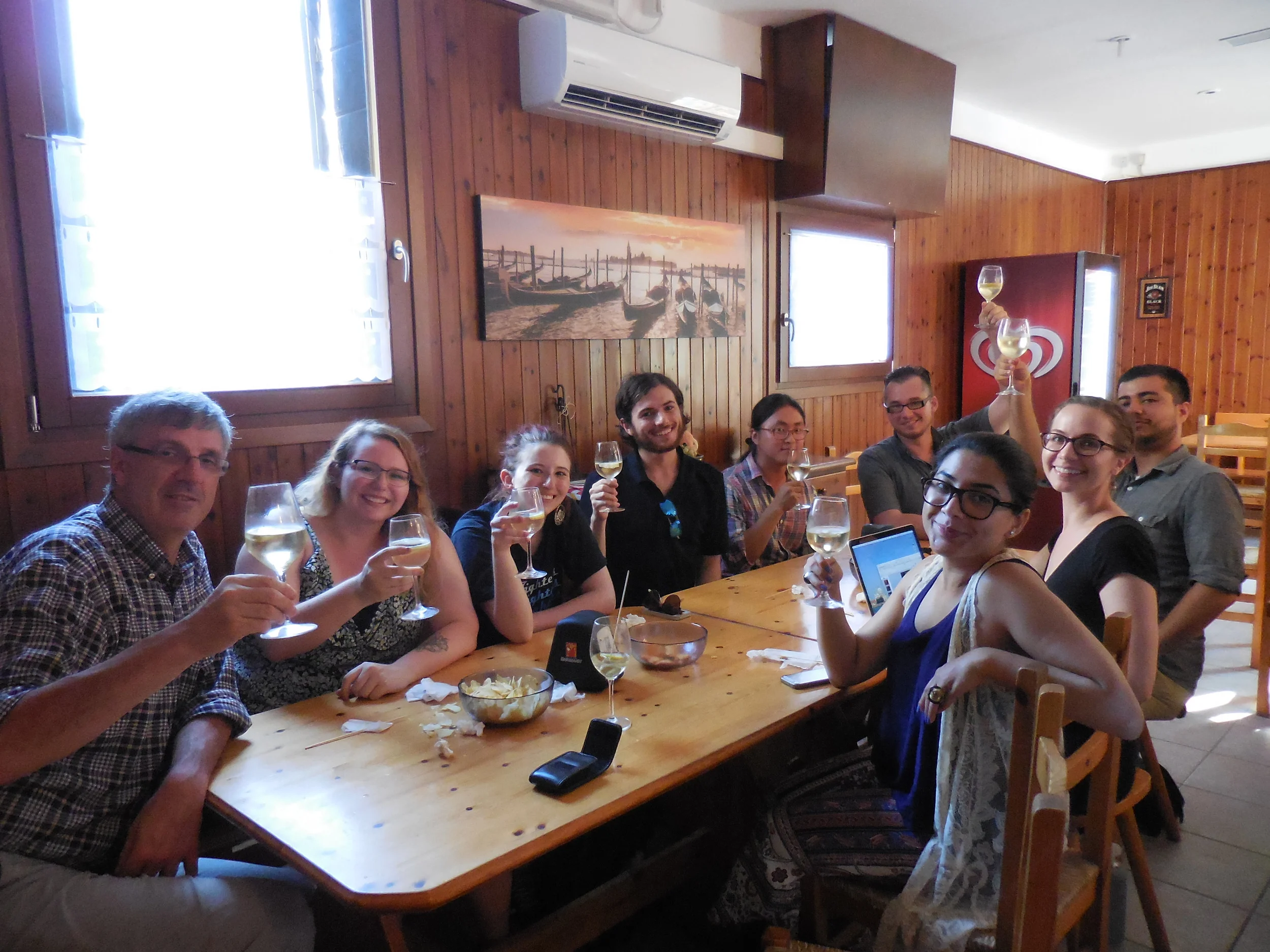 Celebration near UIA following the Materials and Techniques students' presentations. (Back row, left to right: Massimo Angeletti, Alexandra Price, Trish Kaiser, Neil Creveling, Sungwon Hong, Joe Kopta. Front row, left to right: Minaa Mohsin, Polly Cancro, Anthony Vazquez).