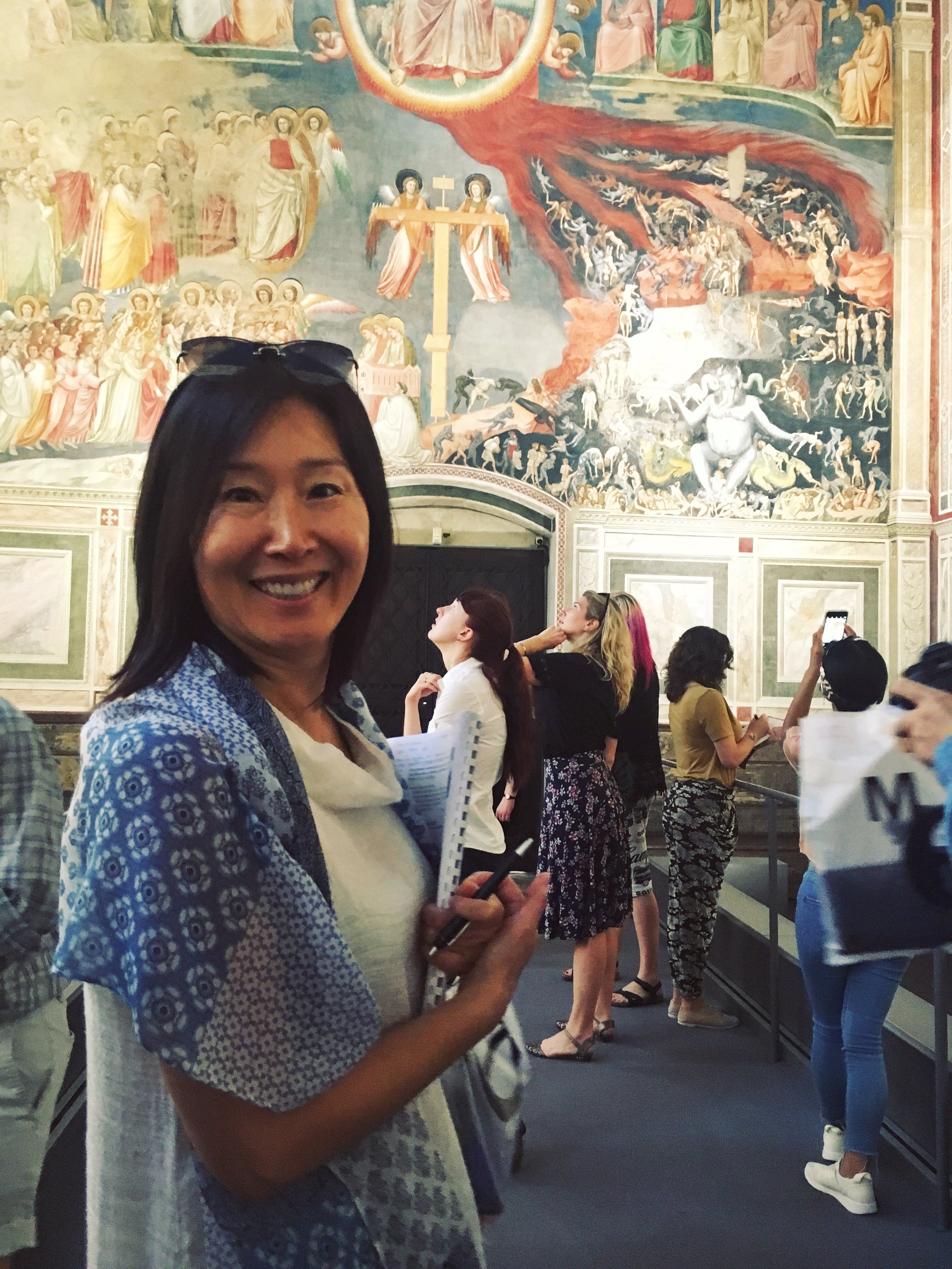 June Kim, undergraduate student of Painting, with Giotto's frescoes in the Scrovegni Chapel in Padua