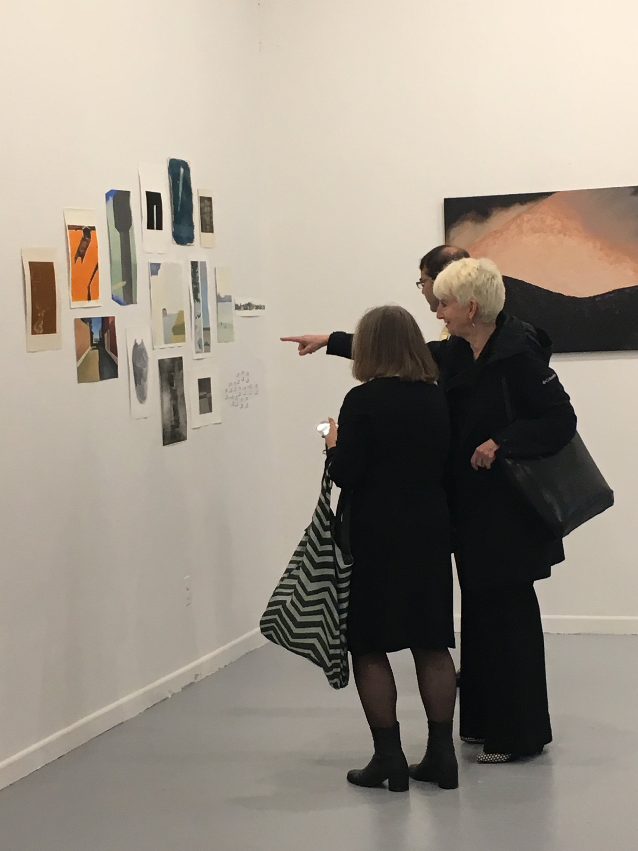 2 - President Frances Bronet, husband Jeff Paules, and Pratt in Venice Director Diana Gisolfi admiring MFA student Xingze Li's work.jpg