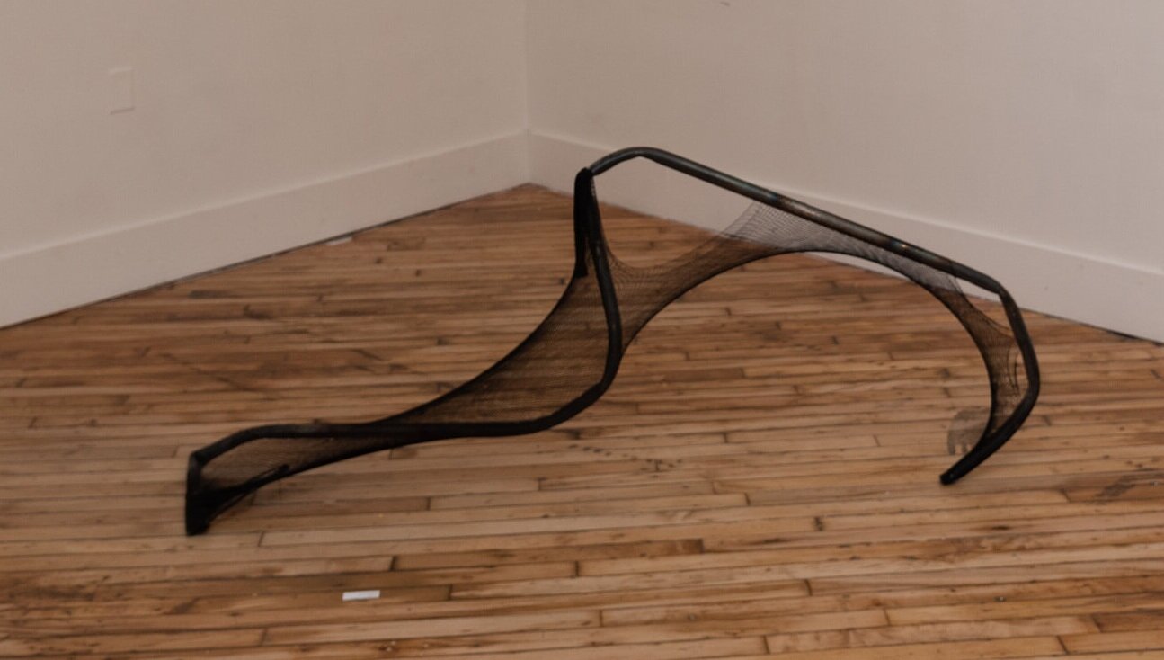  Michele Rushfeldt (PiV ‘18),  Squirm , 2018. Steel and fishnet stocking, 30 x 58 x 20 in. 