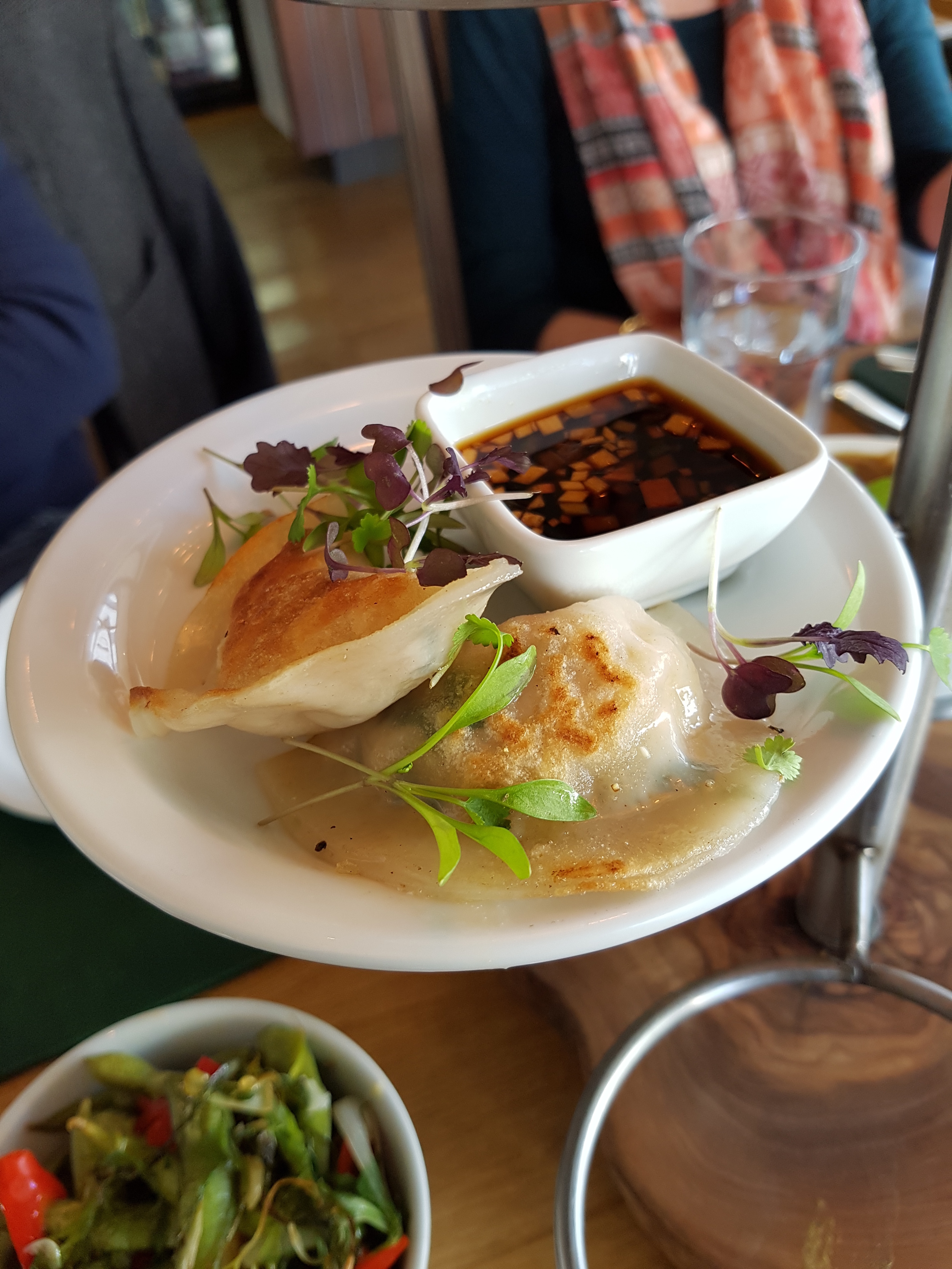 Gyoza filled with quinoa, tofu, peanuts and spring onions, served with Vietnamese dipping sauce  