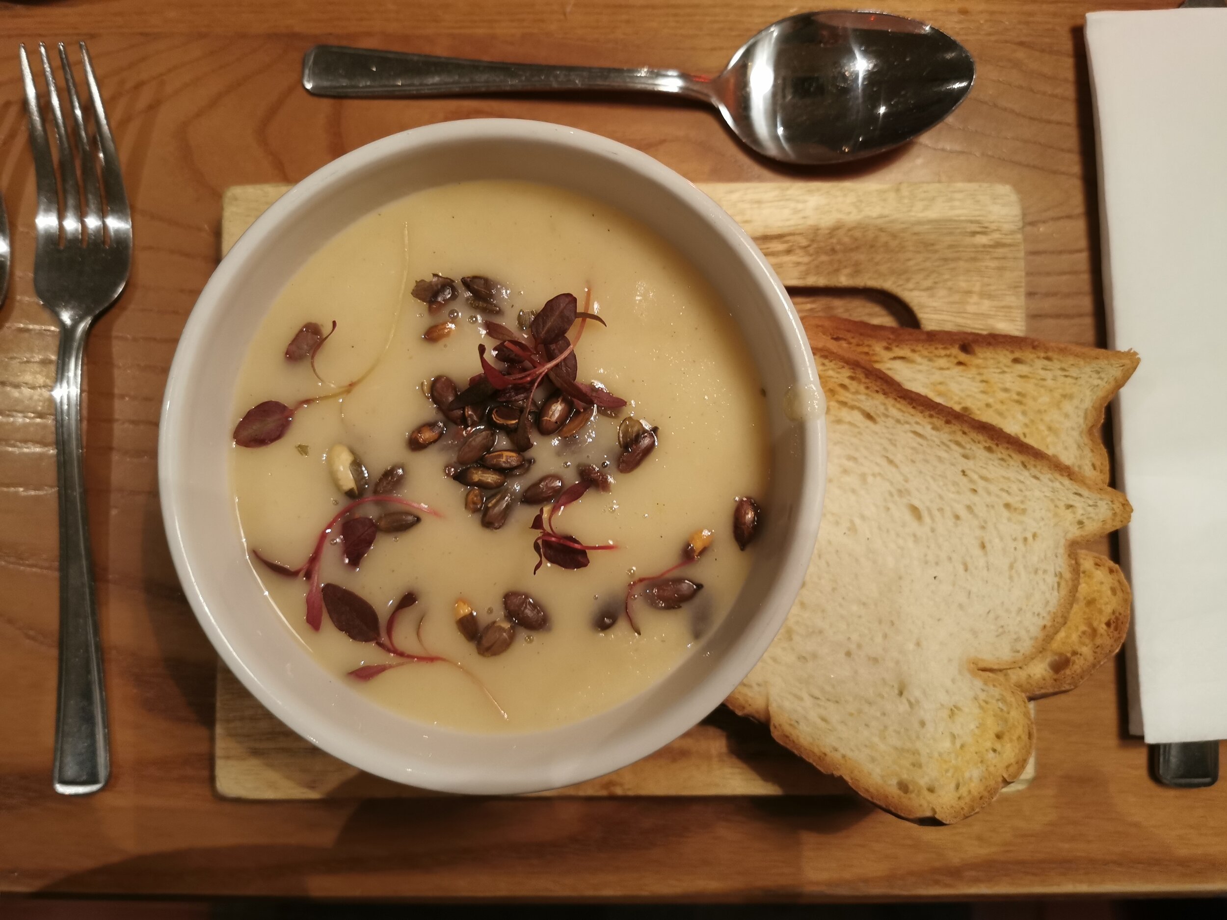 Festive Seasonal Soup: roast parsnip soup with chestnuts and a drizzle of truffle oil, served with rye &amp; caraway bread