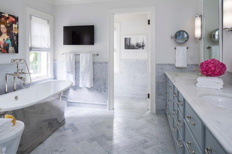 blue-and-grey-master-bathroom-carrera-marble-herringbone-floor-tiles.jpg