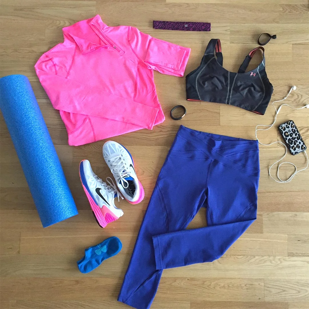 PANTS - Lululemon Pants FOAM ROLLER - Sivan Foam Roller RUNNING LONG SLEEVE - Lululemon Long Sleeve Running Shirt PHONE - iPhone w/ Nike +Running App SHOES - Nike Lunarglide 6 SOCKS - Under Armour Socks SPORTS BRA - Under Armour Sports Bra HEADBAND - Lululemon Fly Away Tamer Headband FITNESS TRACKER - Nike FuelBand