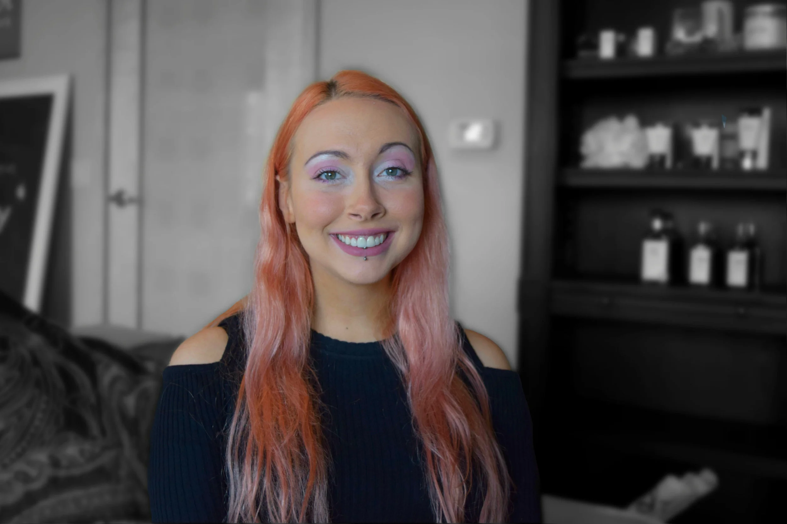 Megan Headshot with blurred background final.jpg