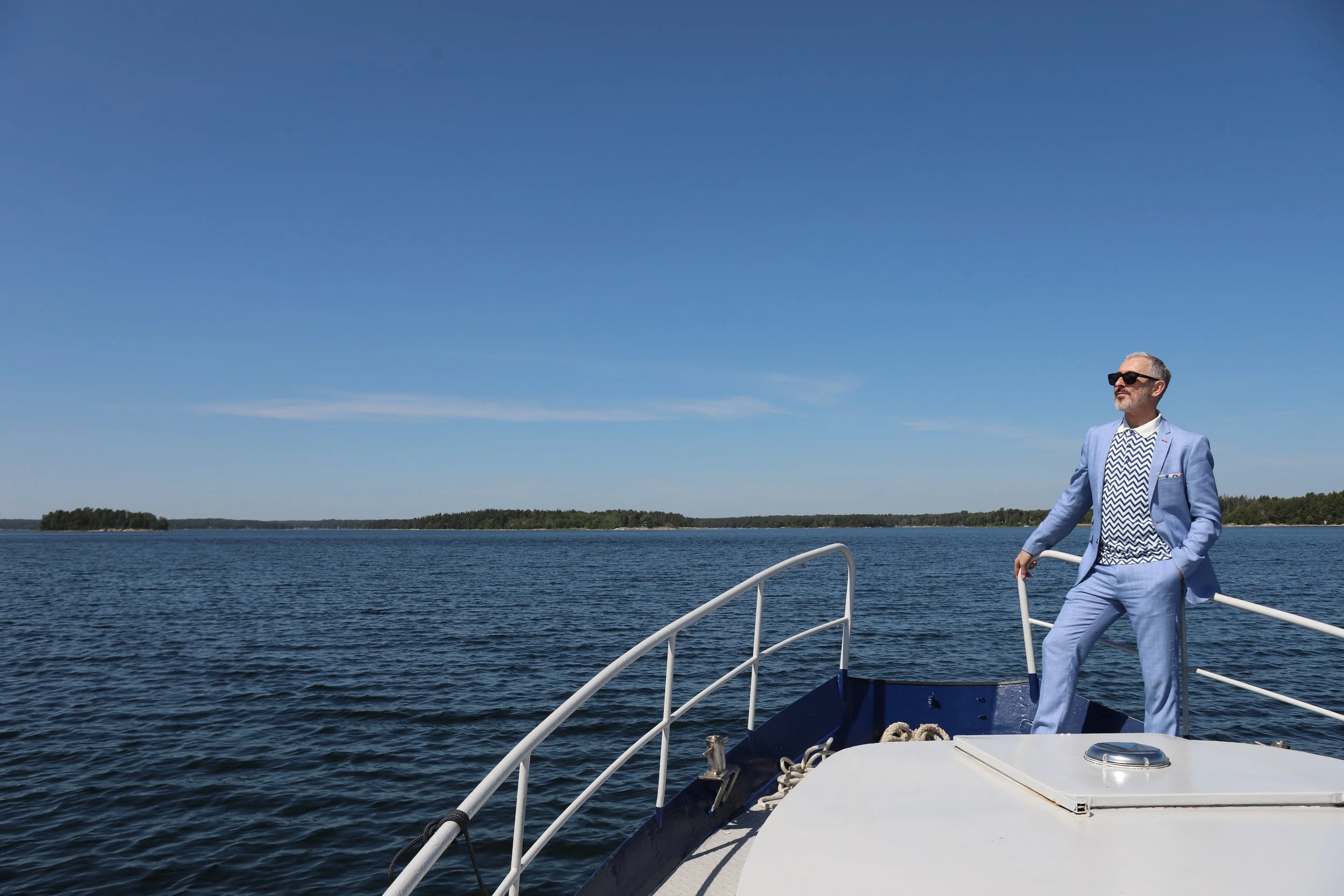 Alan in a boat in Sweden.JPG