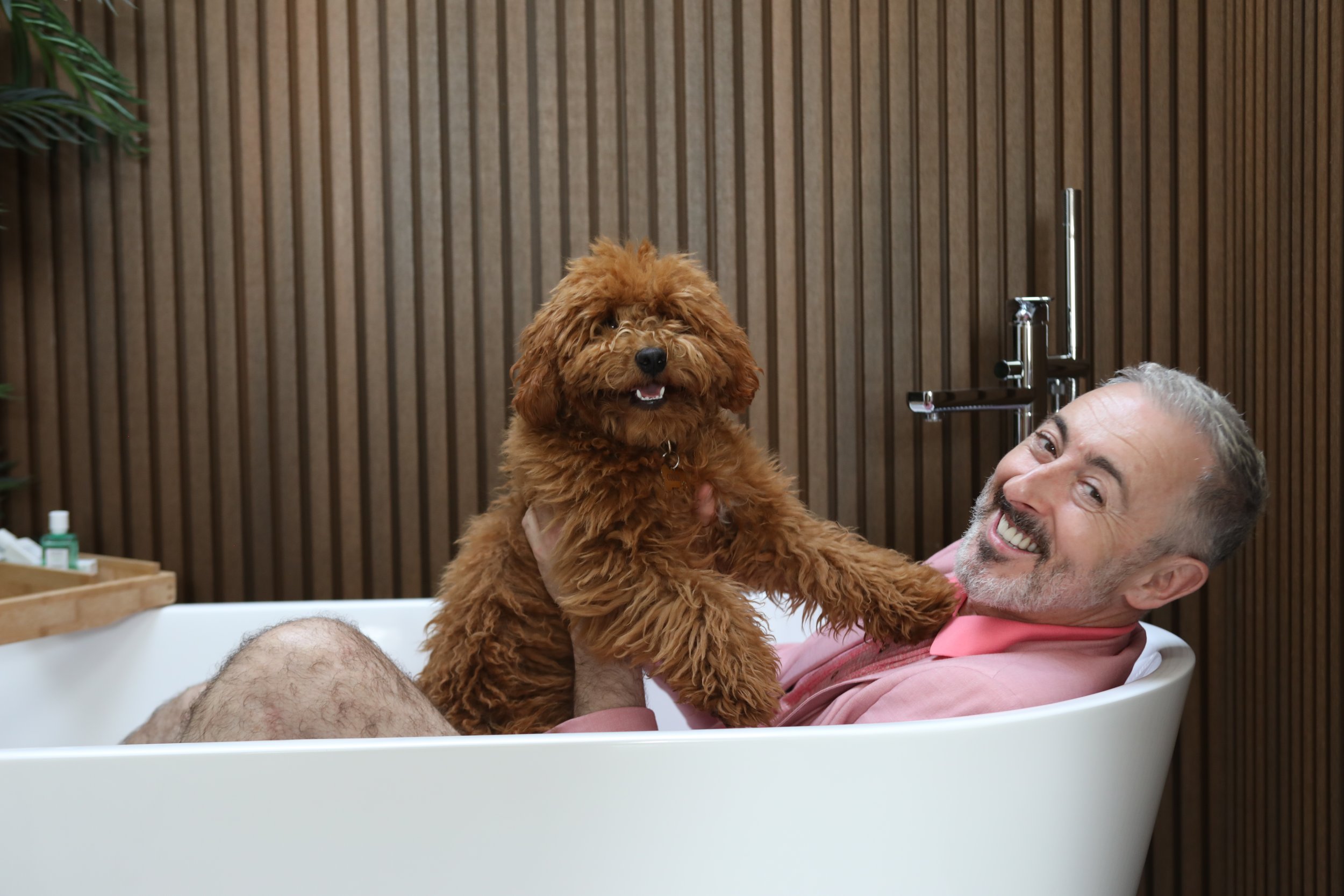 Alan in the bath with the dog.JPG