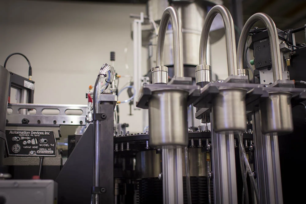 Multi-station reel-fed automation machine