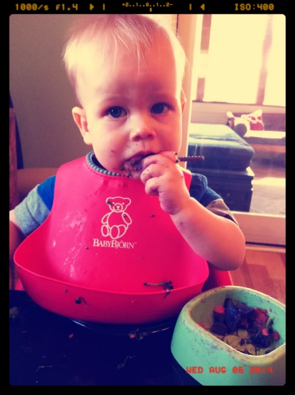 By the end, both cheeks and hands were purple - and he loved it!