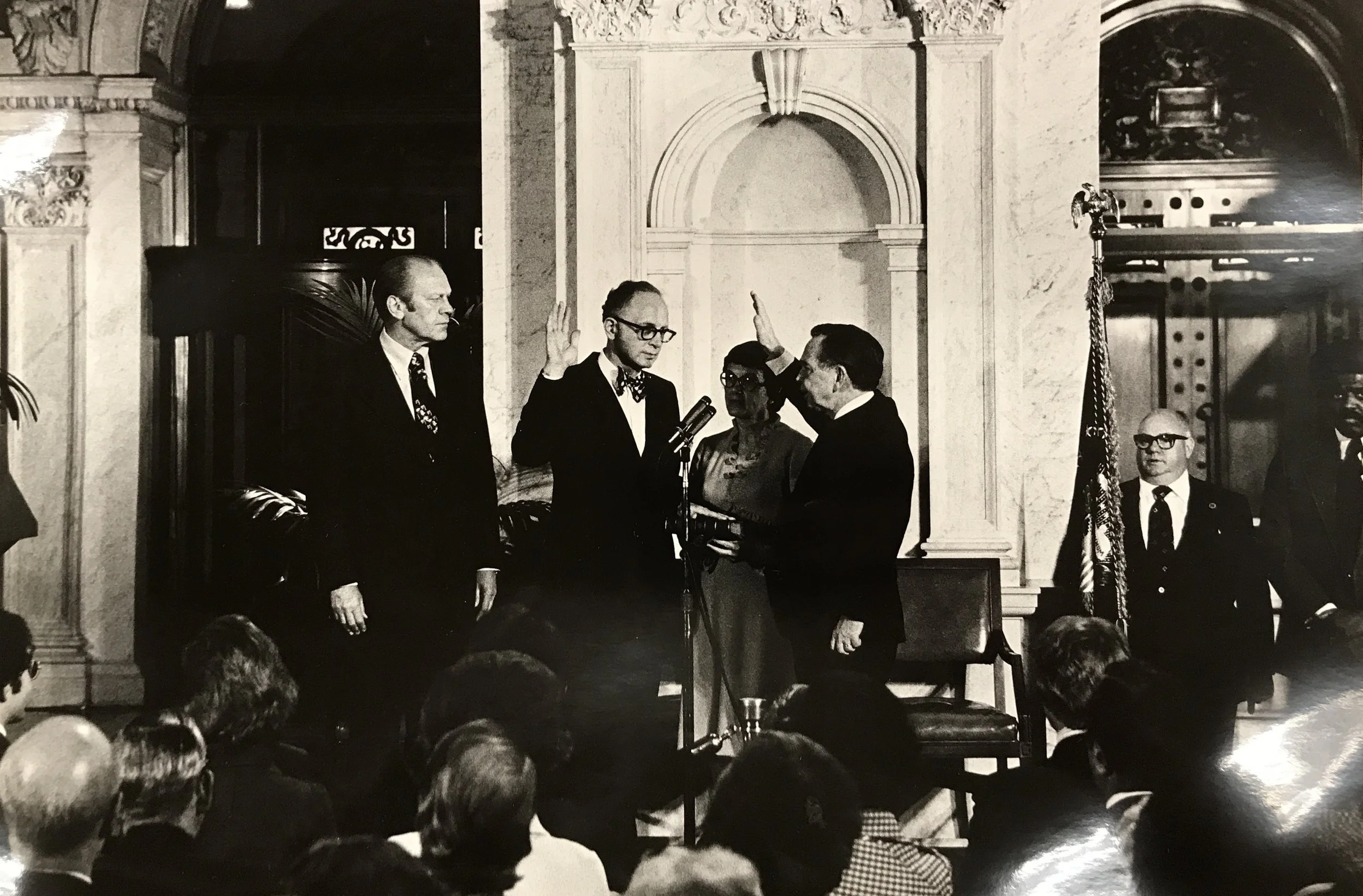  Daniel Boorstin being sworn in as Librarian of Congress, with his wife Ruth as Best Man. 