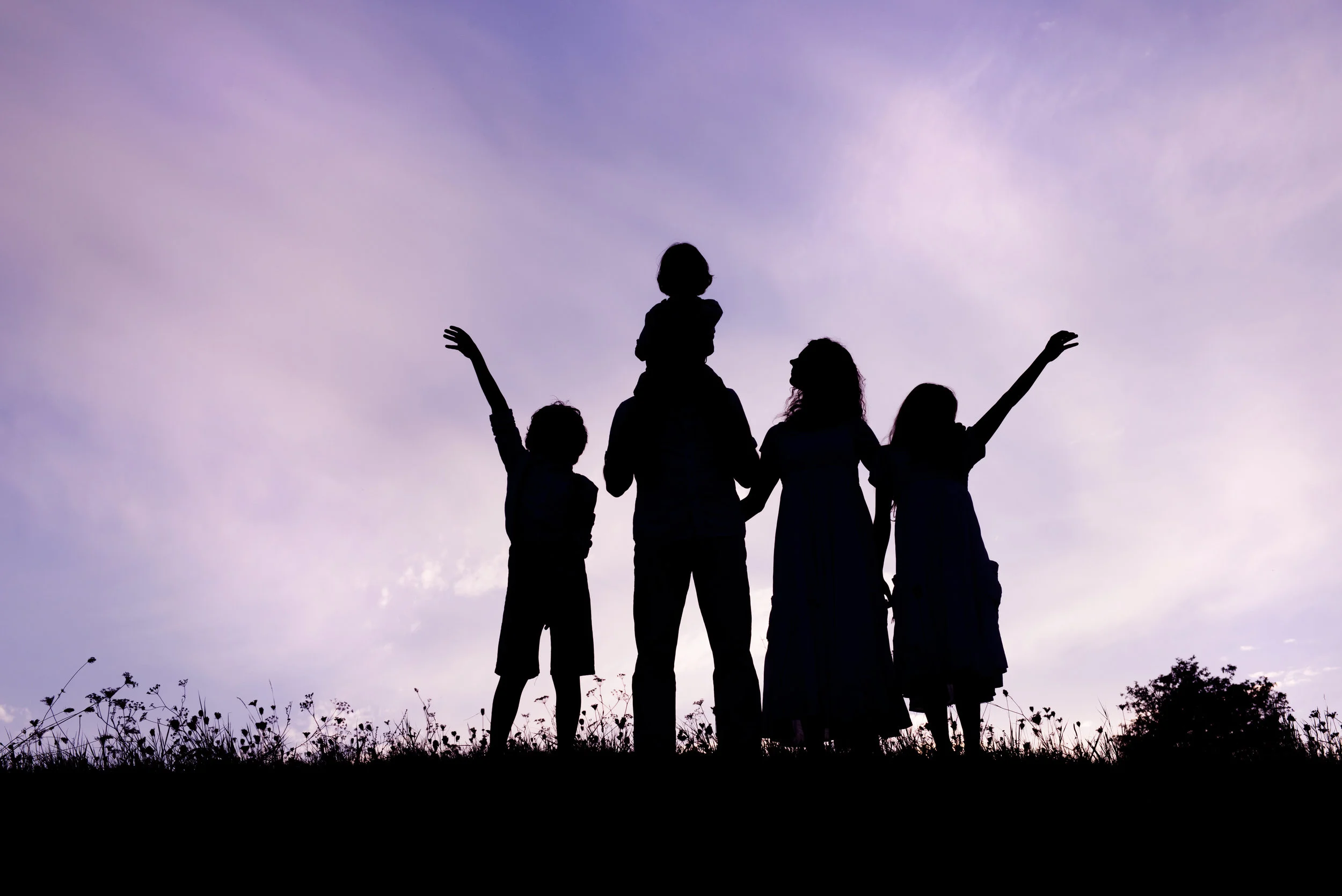 graphicstock-silhouettes-of-happy-parents-having-fun-with-their-children_BRjNgxsZZ.jpg