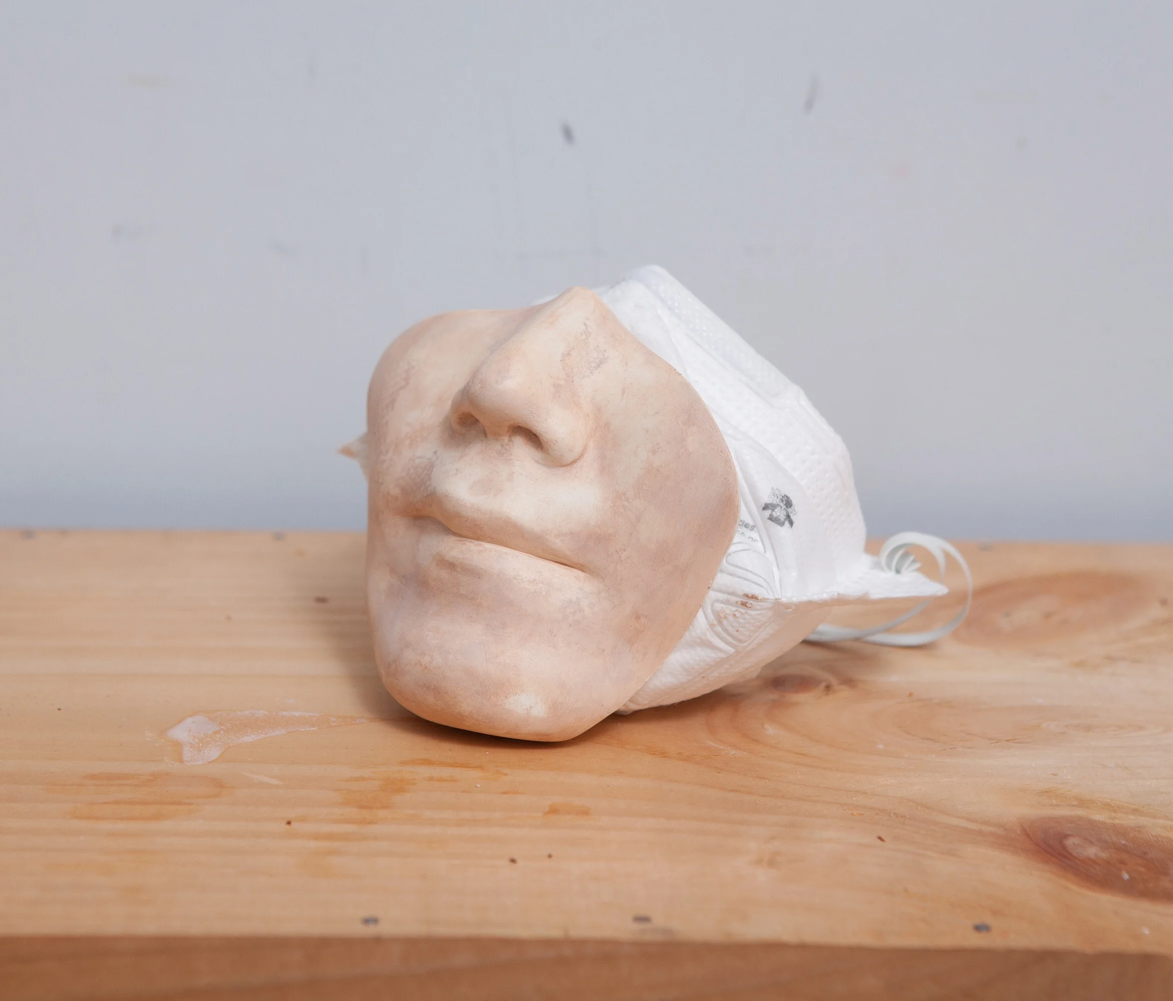 BB cream, acrylic painted on plaster, mask W6"xH5"xD6" 2015