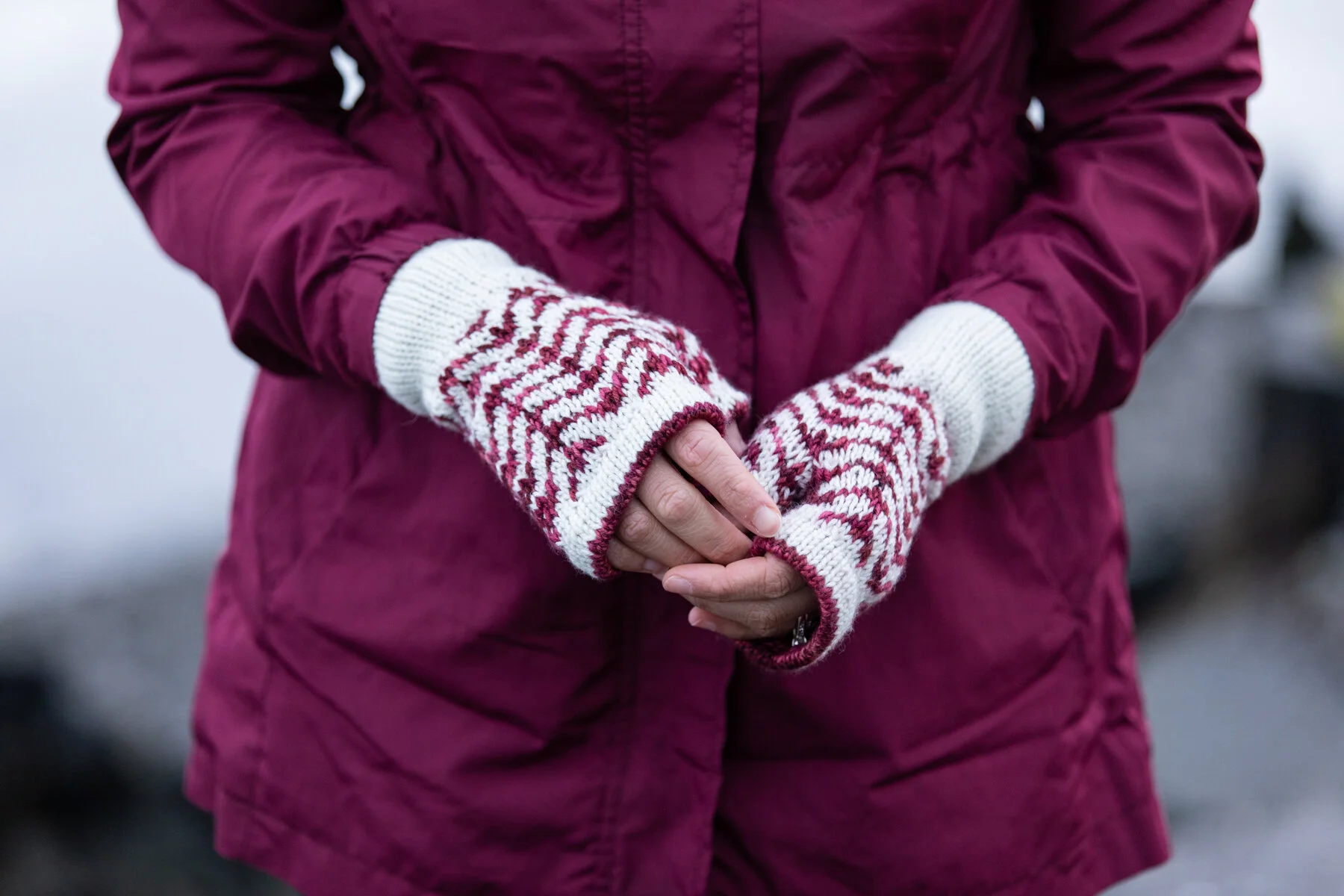 Front view of the Novemberist Mitts, handknit fingerless gloves with genuine warmth thanks to the doubled edges & colorwork floats. Unique thumb gusset shaping allows motif continuity around the hand.