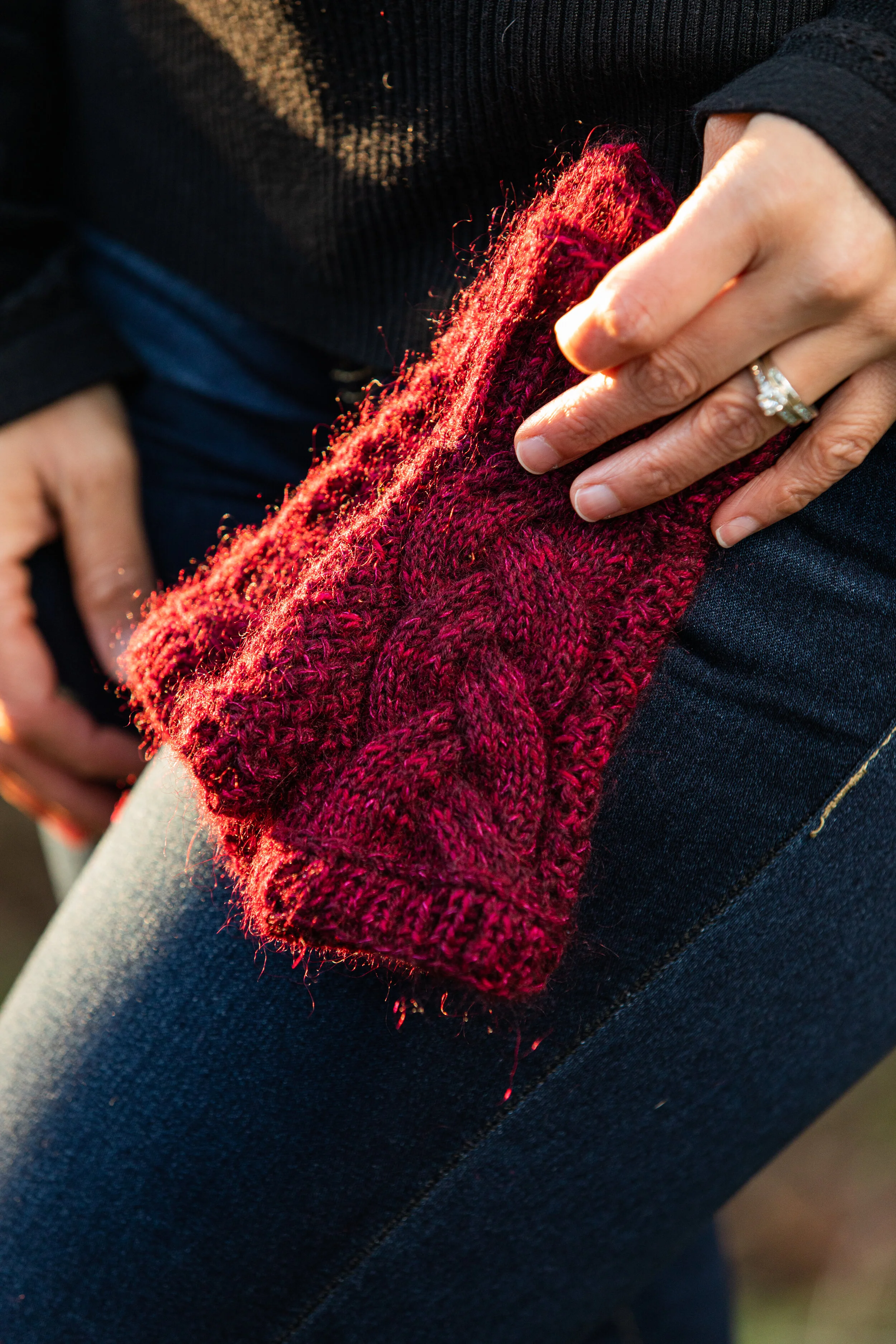 indira-mitts-red-cabled-fingerless-glove-knitting-pattern.jpg