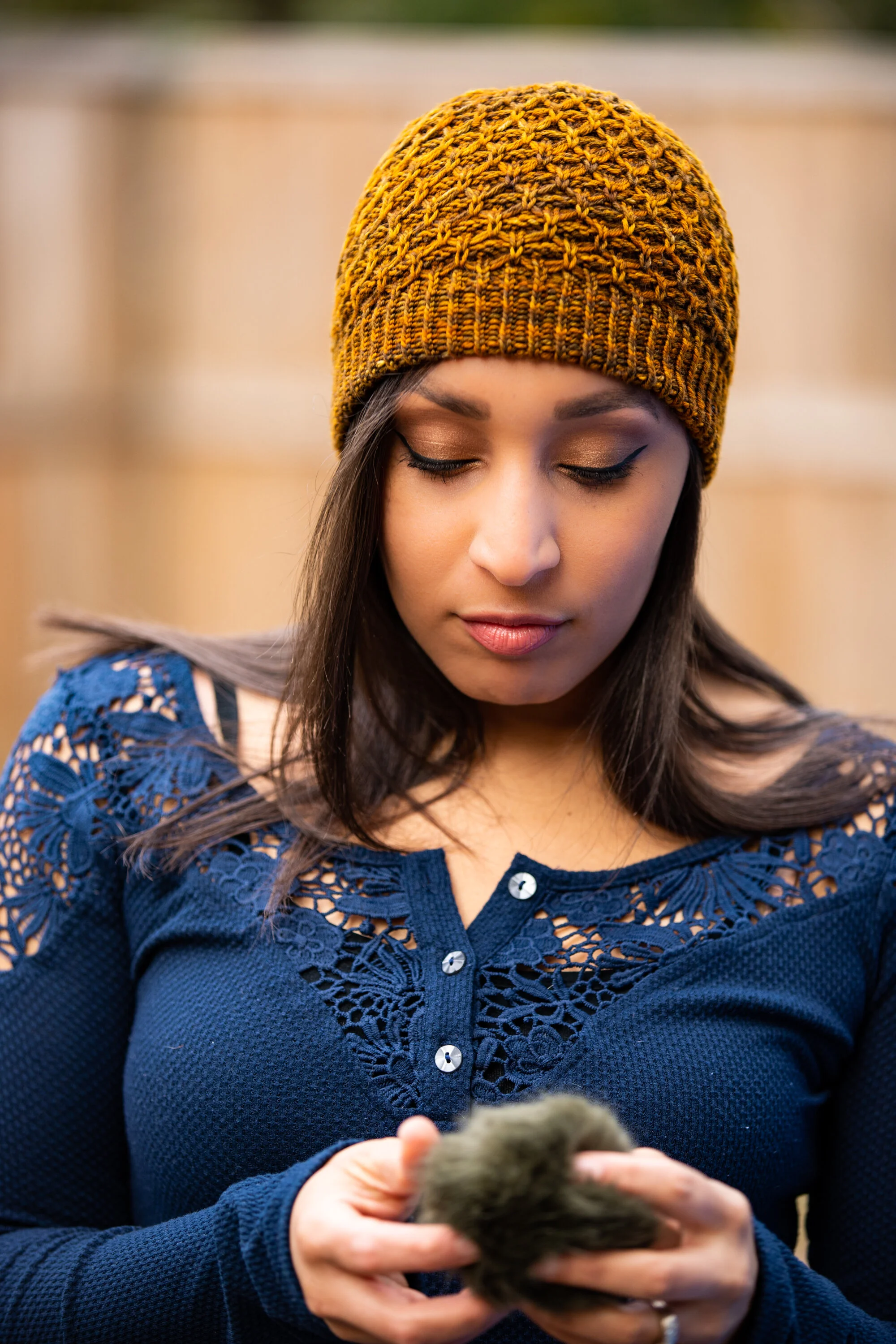 Front view of the Aslyn hat, featuring a squishy, double brim and easy all-over texture. Made with sport weight yarn in a variegated or semi-solid color. PDF knitting pattern by Vanessa Smith Designs.