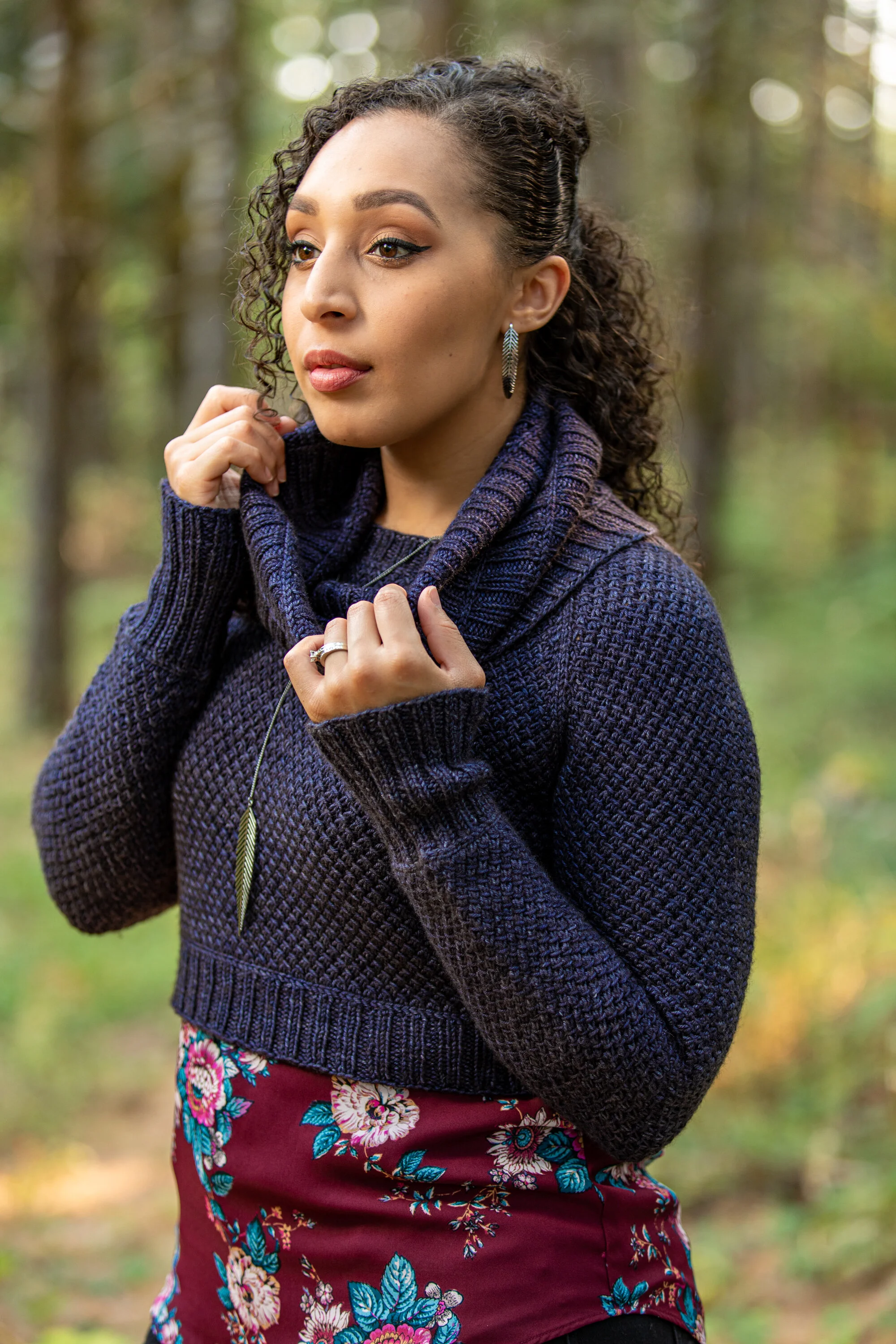 Modern knitwear designer Vanessa Smith wears her Nydia pattern, a non-boxy cropped, raglan sweater with a detachable cowl. Knit in a sumptuous texture similar to Tunisian crochet. Digital PDF download
