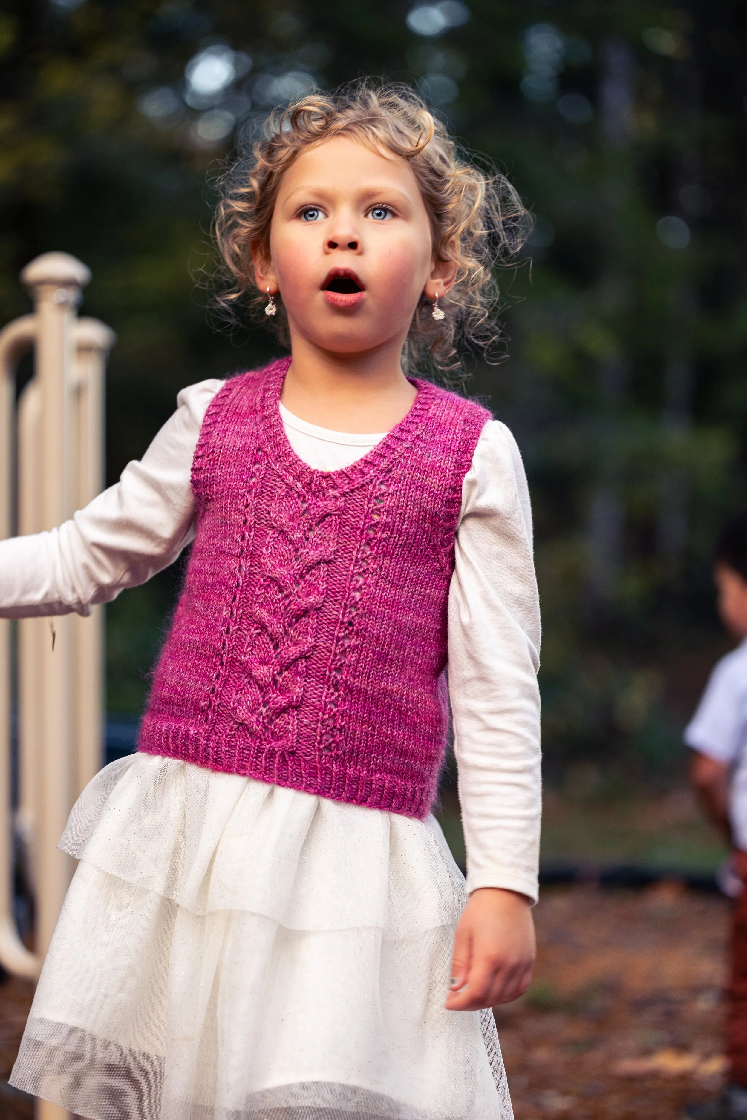 Impress your friends and family with the Bittie Bittie Vestie, a timeless, handknit heirloom piece with beautiful and thoughtful finishing details by Pacific Northwest knitwear designer Vanessa Smith.
