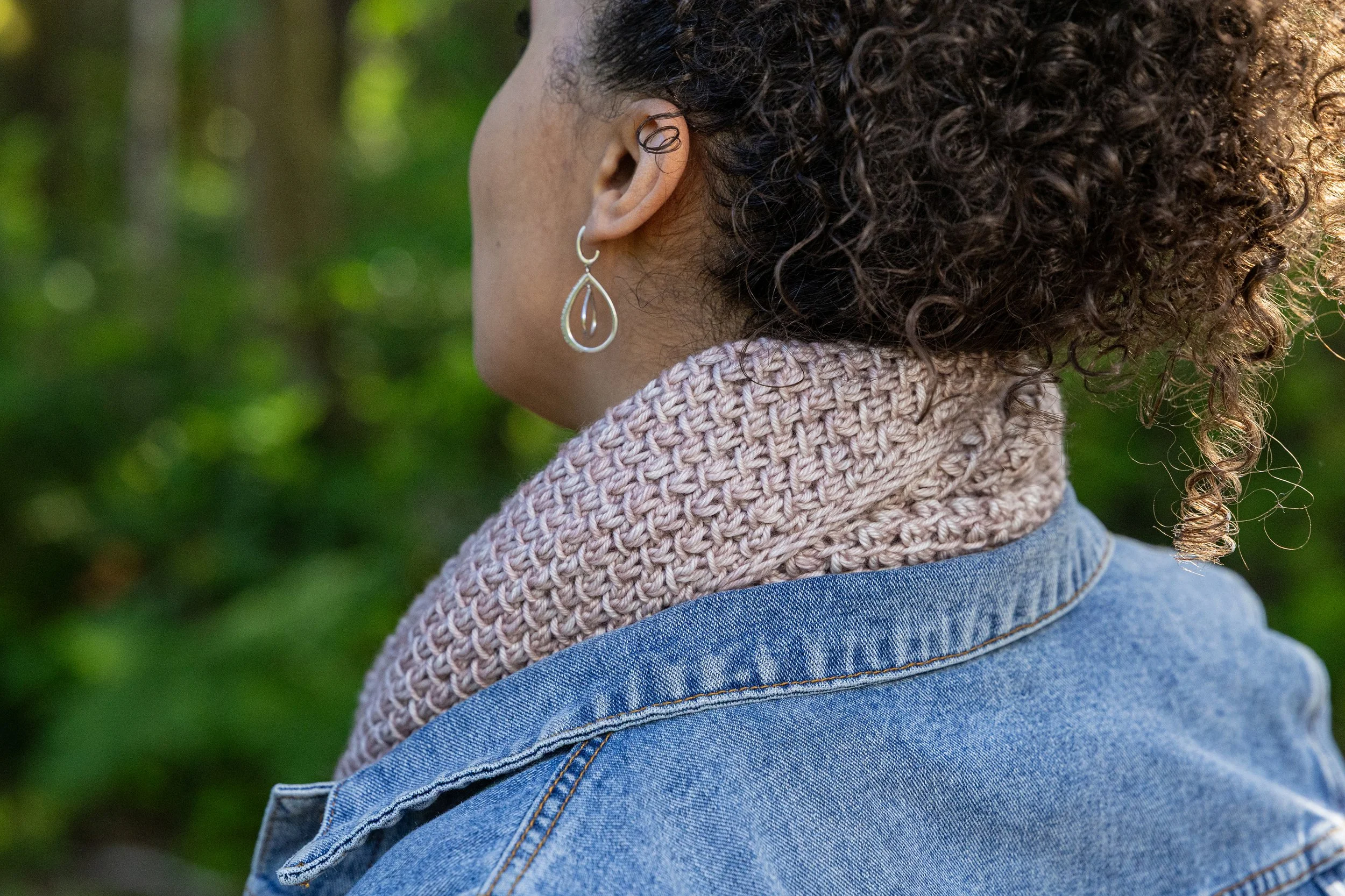 Close-up view of the textured lace stitch used in Vanessa Smith's Tipping Point Scarf knitting pattern, available as an instant PDF download & accompanied by a video tutorial guide showing the stitch.