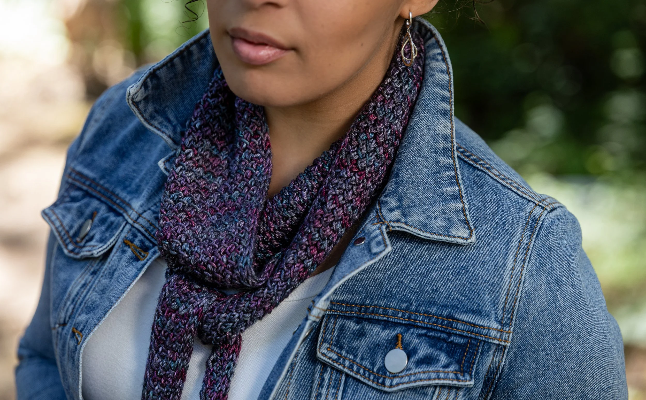 Detailed look at a skinny, i-cord edge triangle scarf knit with one skein of hand-dyed yarn, using the beginner-friendly Tipping Point Scarf knitting pattern. Instant PDF download & video walkthrough.