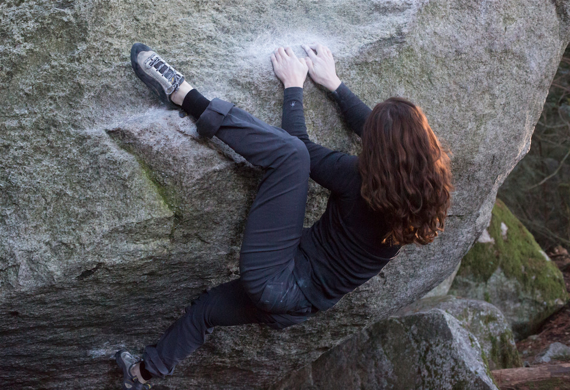 Diana locks a heel hook, ignores frozen purple toes and leans into it.