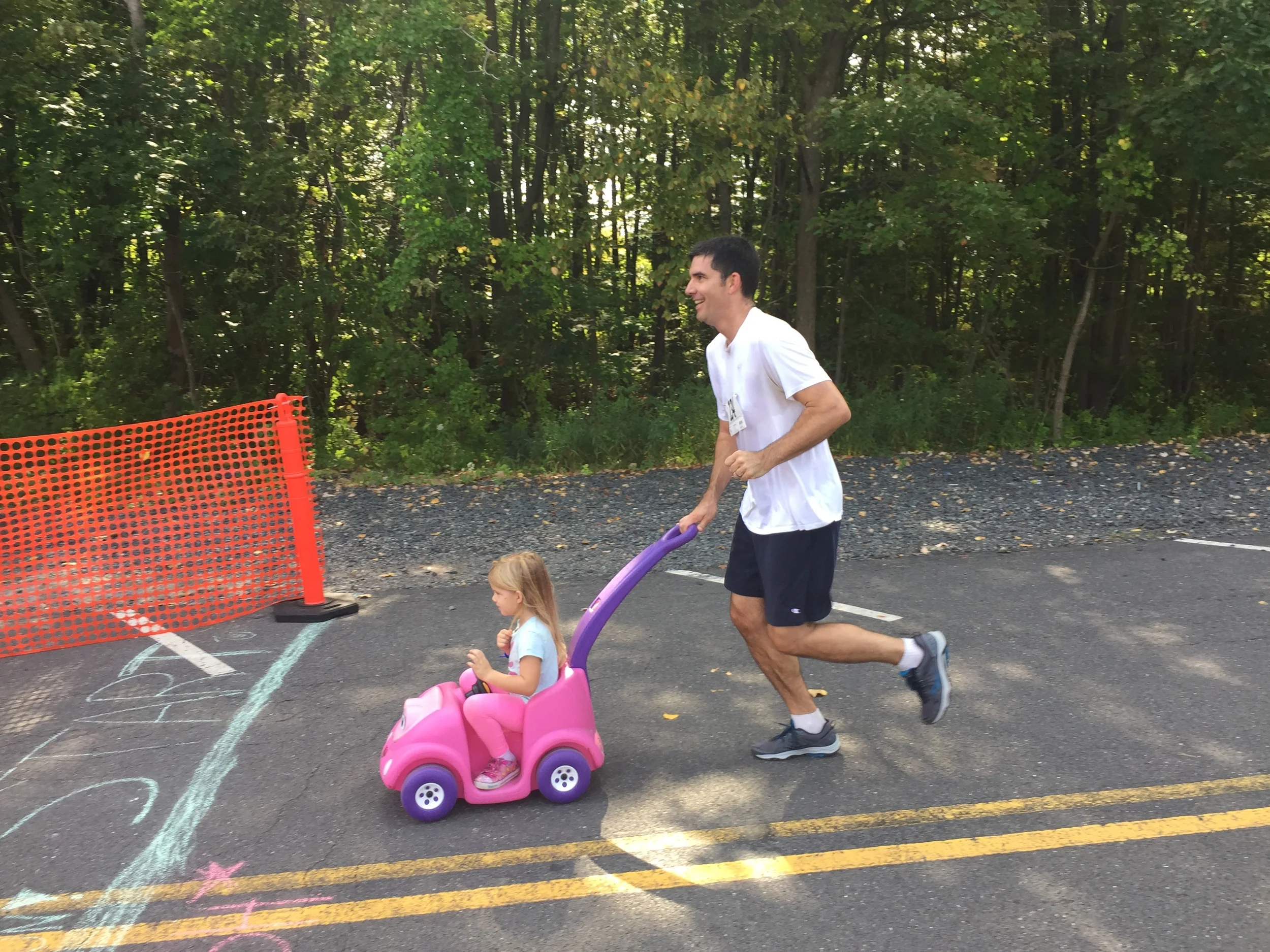 Dr. Jason Ryan bringing it home with his little one leading the way.