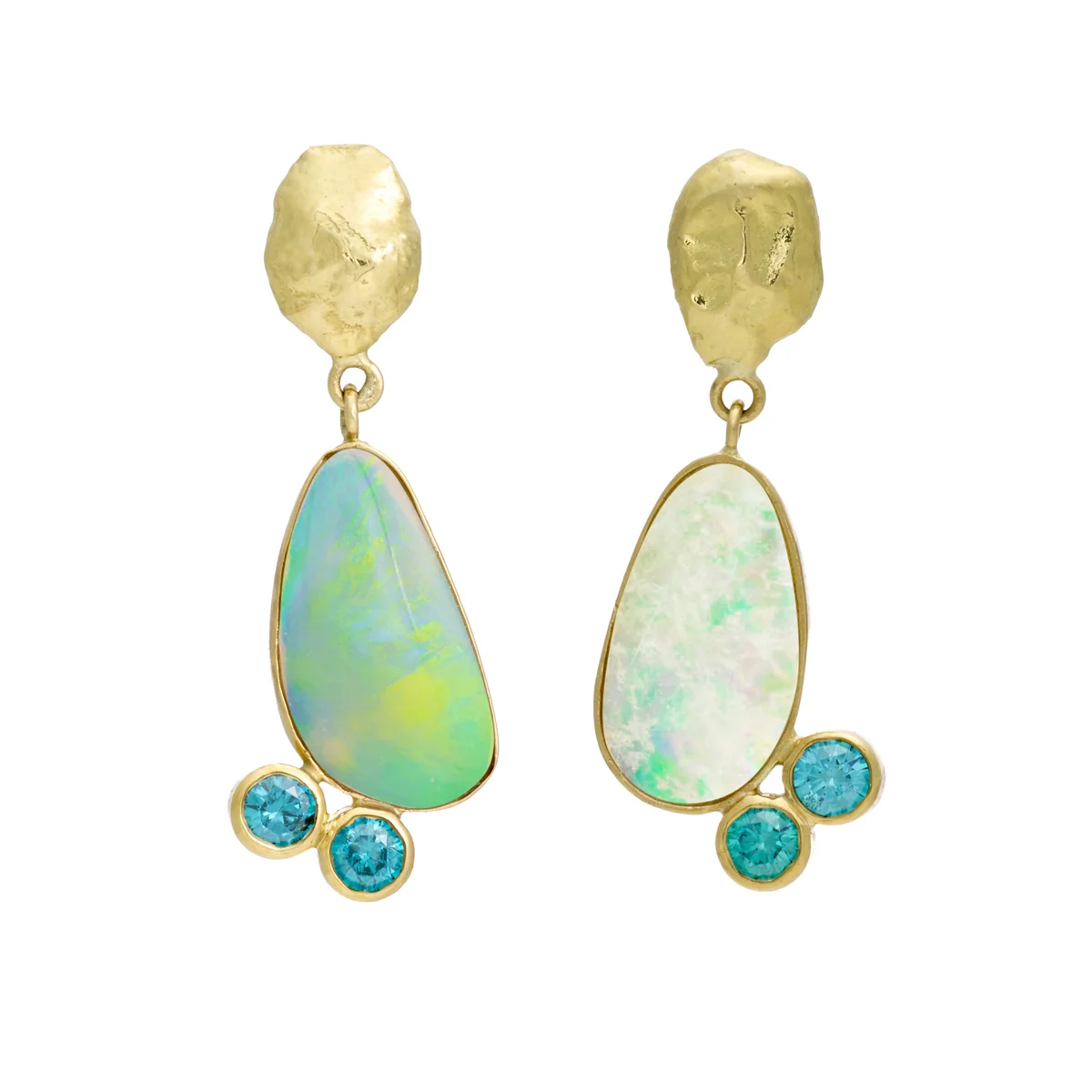 Drop earrings featuring blue diamonds and opal. Click here