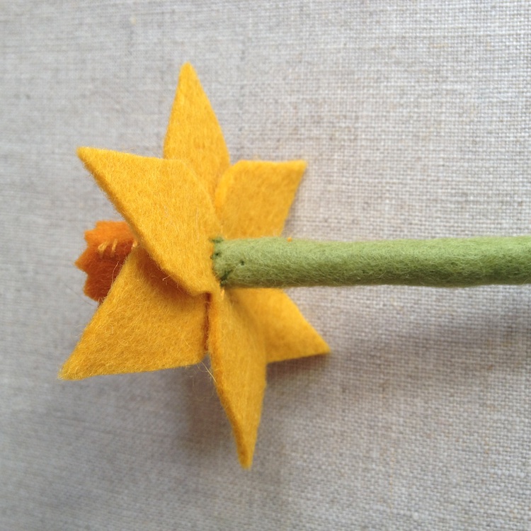 Sew flower onto stem