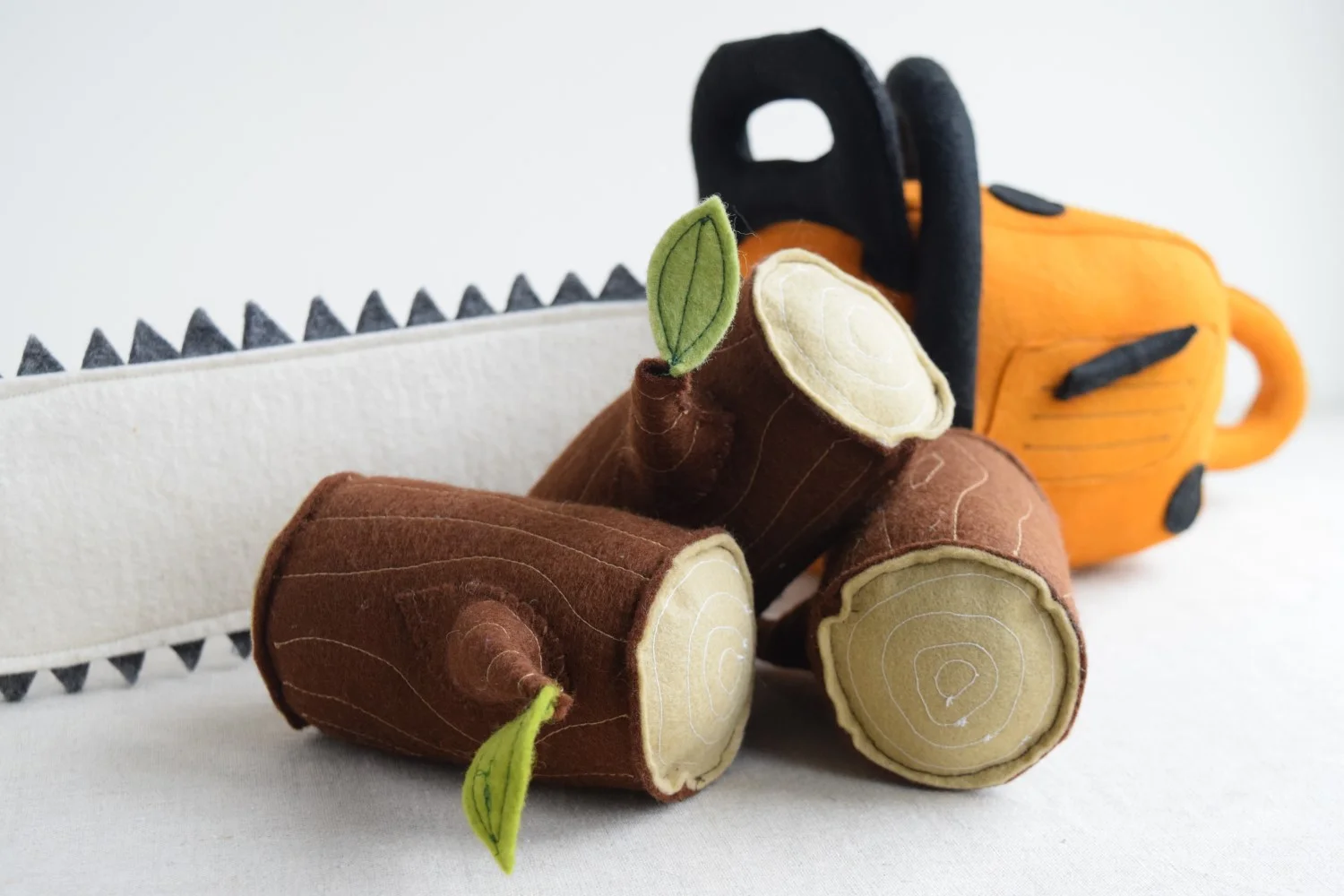 Chainsaw and Log Bundle