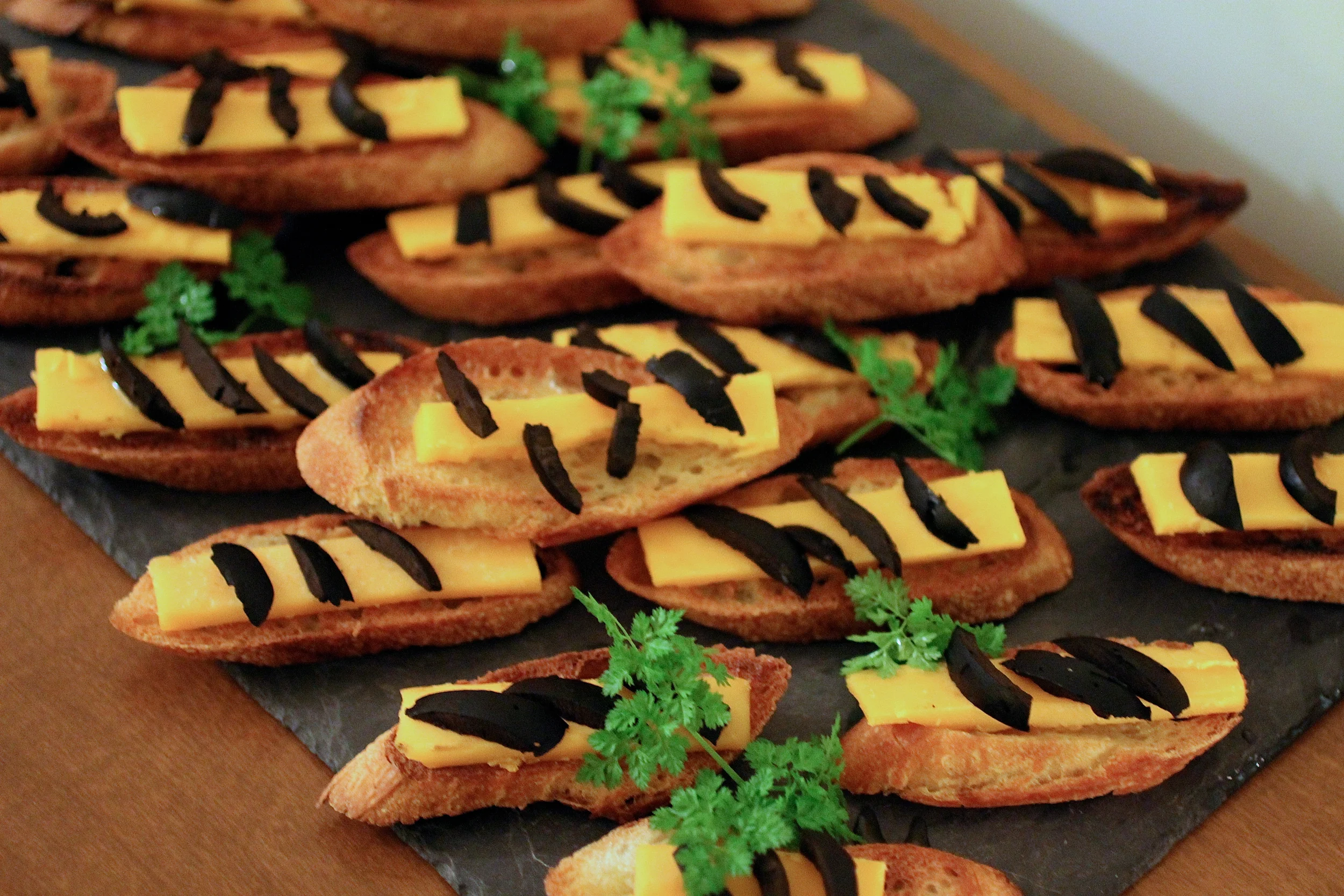 Pickled green walnuts are perfectly balanced by sharp cheddar and fresh chervil.