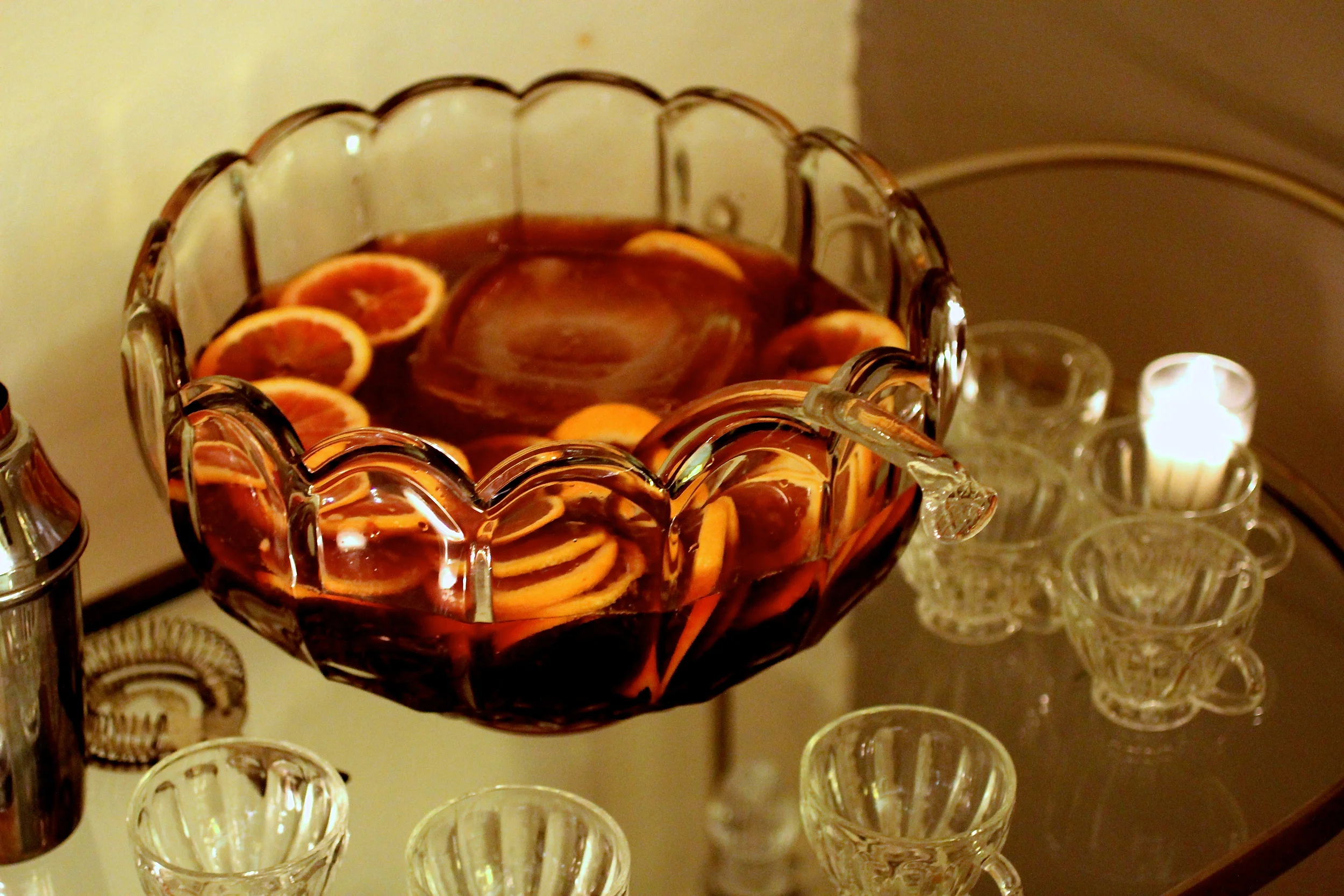 The punch of the hour, Royal Pomme, with blood orange, apple jack, champagne, and bitters.