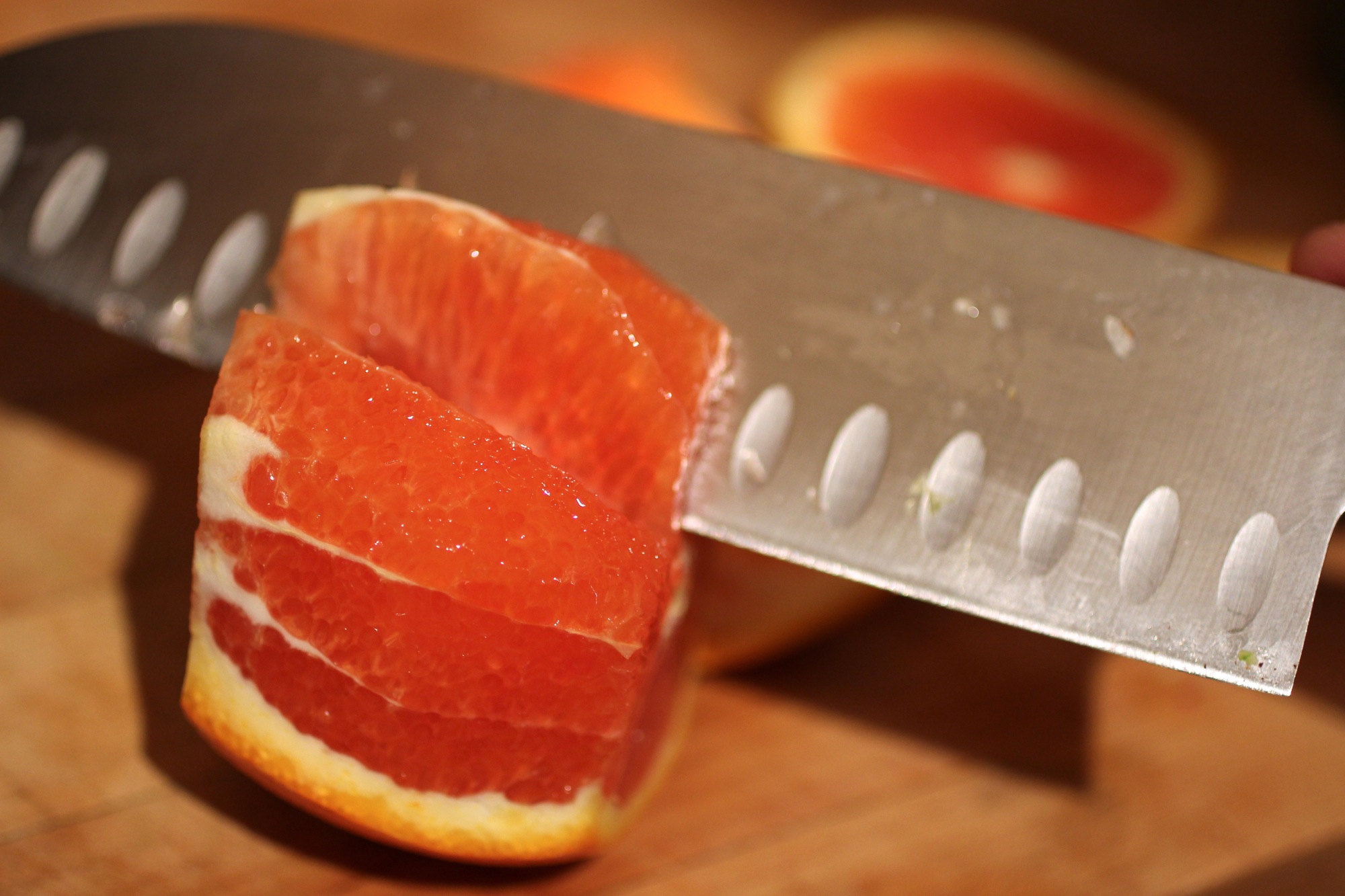 Cut into flesh to remove segments.