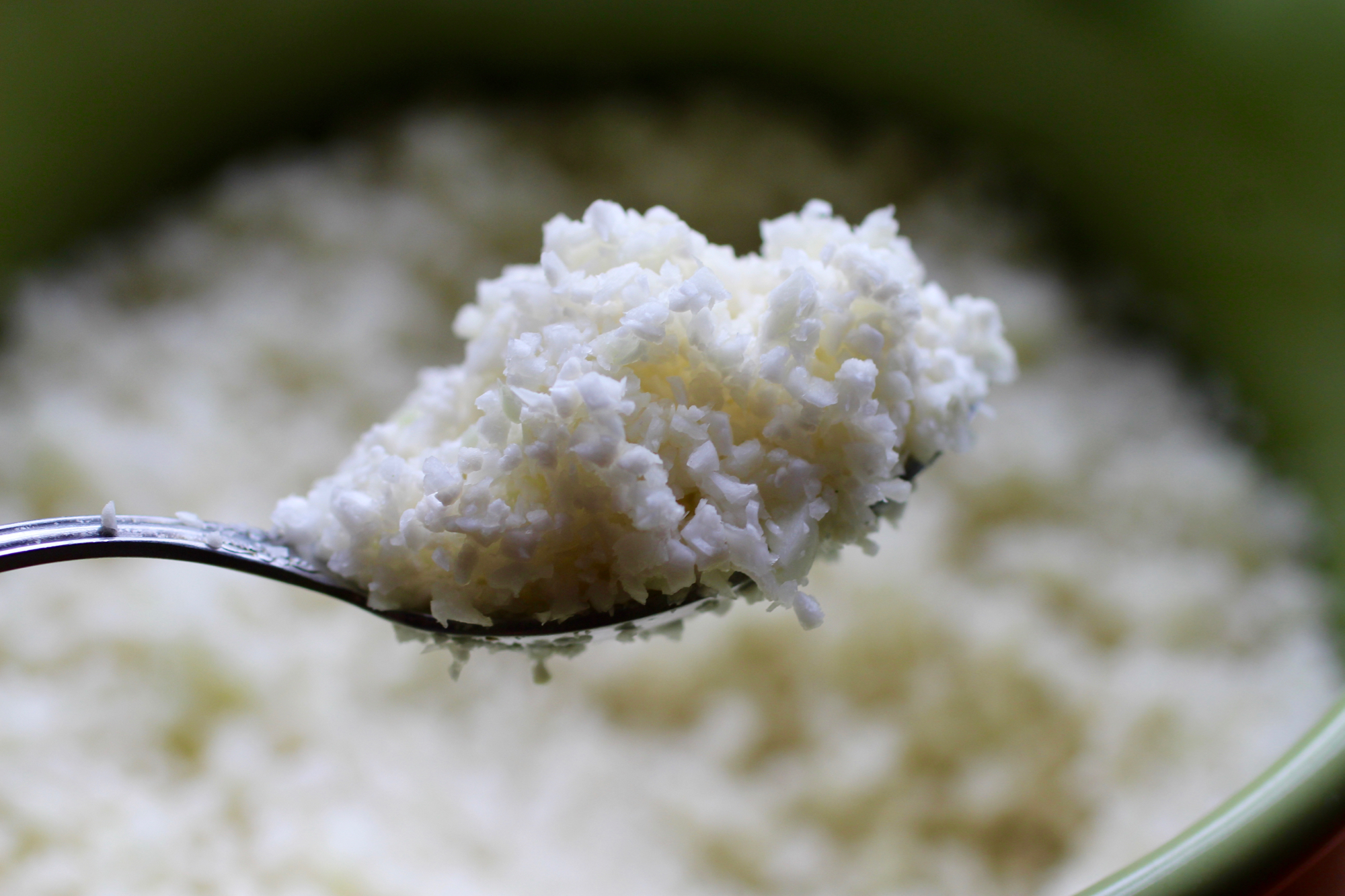 Process cauliflower until it resembles grain.