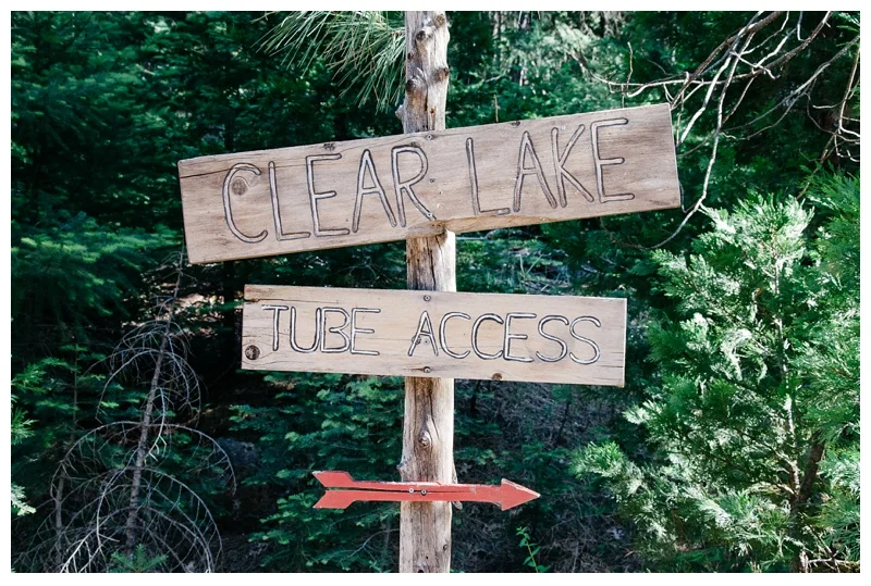 The sign for Clear Lake tube access. Travel photography by Max Salzburg of Sonja K Photography.&nbsp;