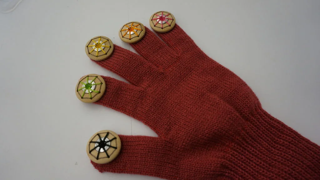 In this project, I focused on an aesthetic design. So, I sewed conductive threads to invisible ways. Normally, when people make a kind of LilyPad gloves, they sew outer surface. I spent a lot of time in this section.