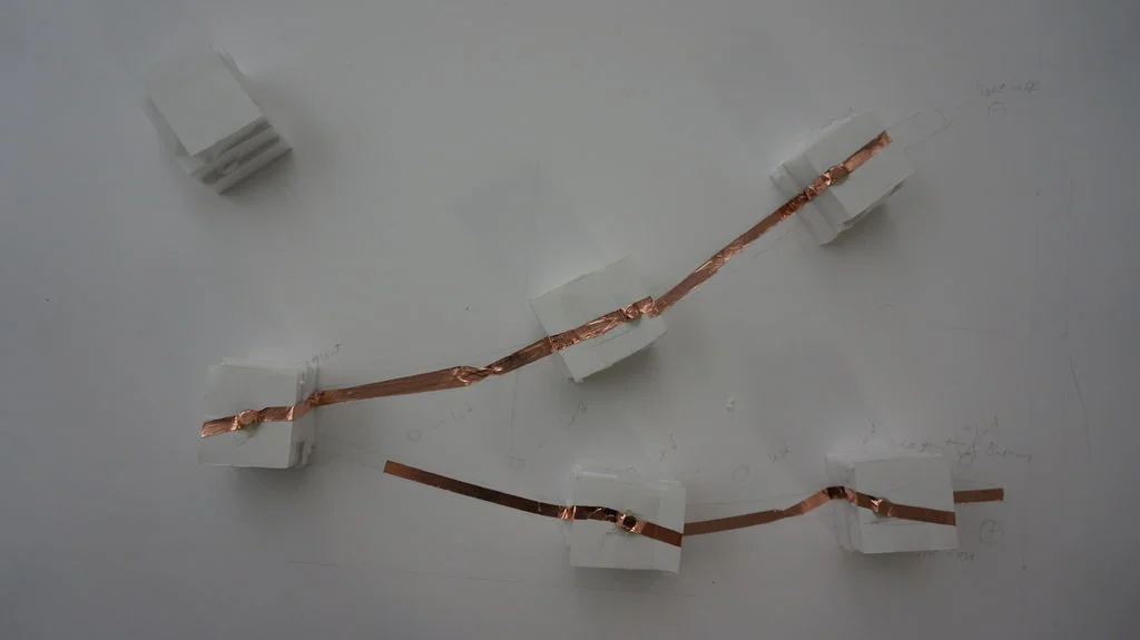 Step 5: Build Circuits. Make the space around 3~4cm with the pieces of the extra boards and place copper tape with magnets.