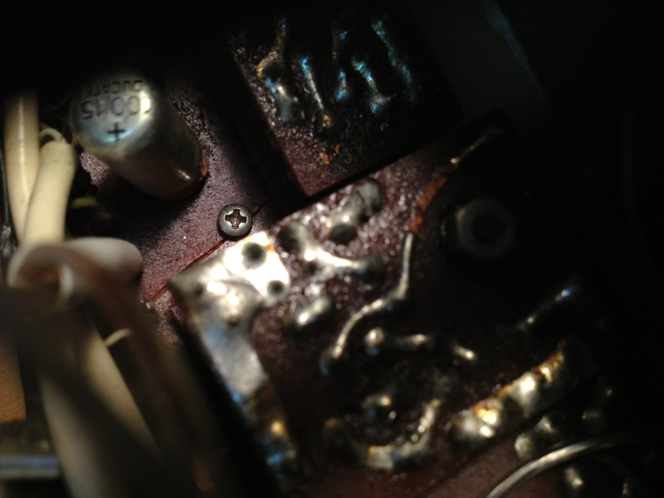 Main circuit board module cracked at mounting screw.