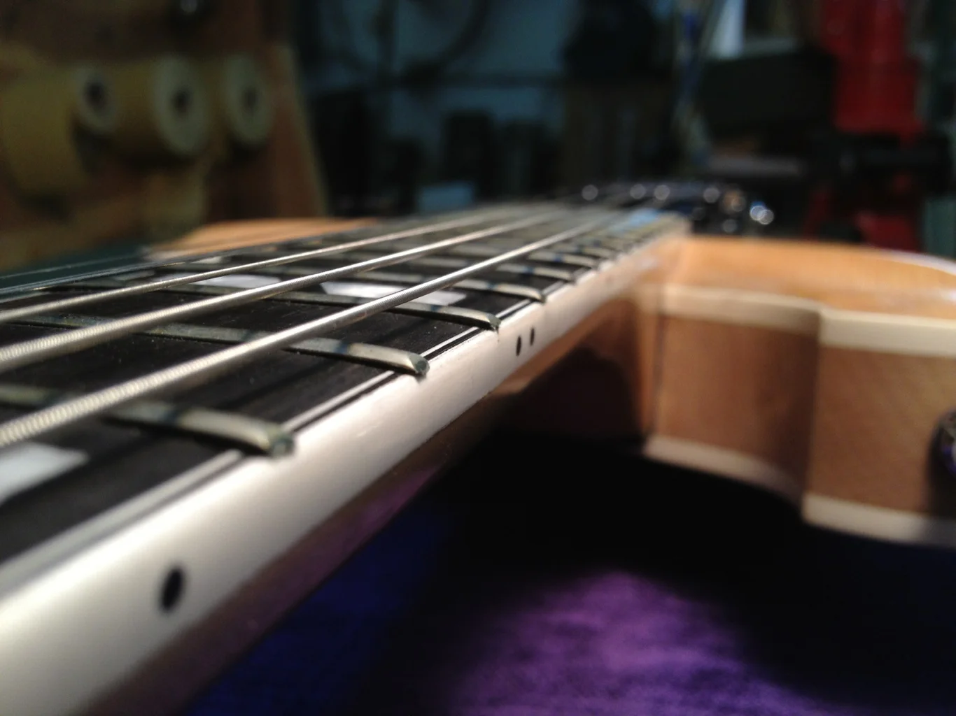 Lifted fret ends making for uncomfortable playing