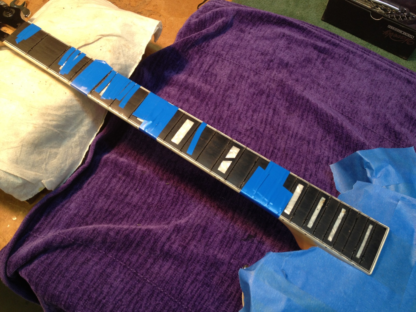 Loose binding reglued before sanding.