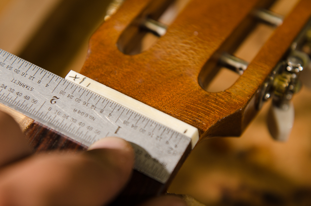 Converting a 2″ wide nut into a 1- 3/4″ nut to decrease string spacing