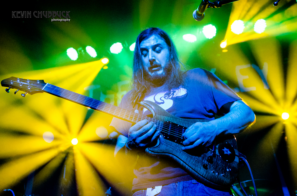 Kenn Mogel (of the former Psychedelphia ) and his left-handed Artinger guitar. Strung righty, played lefty. Note the bass strings are towards the floor. Photo © Kevin Chubbuck
